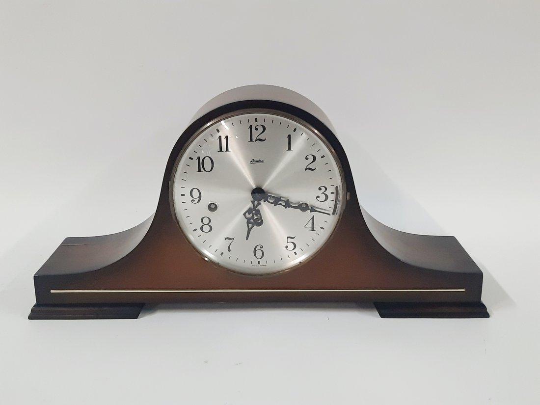 Linden Mantel Clock: Starts and stops. H. 9" W. 20-1/2" D. 5"