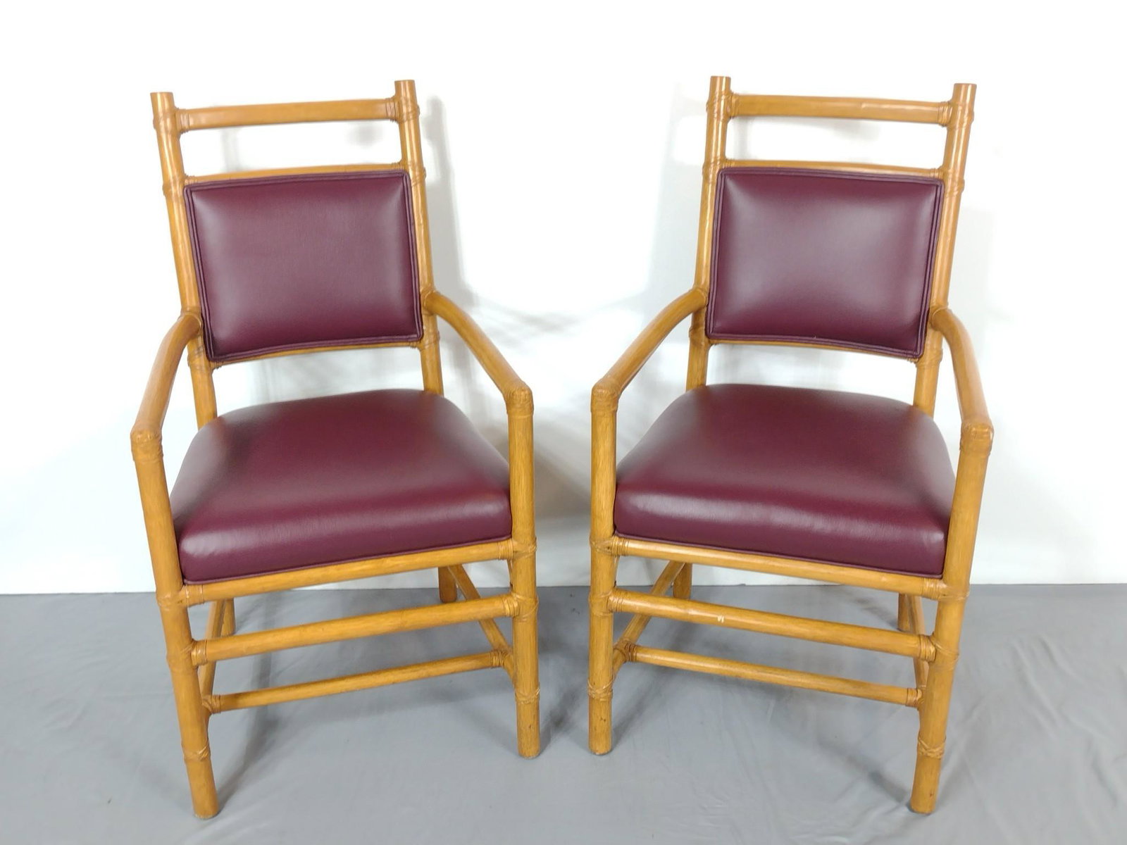Pair Of Lacor Rattan Chairs: 20-1/2" wide X 20" deep X 37" high. MG. IMPORTANT: Before bidding, please read the terms and conditions. When you registered for the auction you agreed to these terms and will be required to comply wi