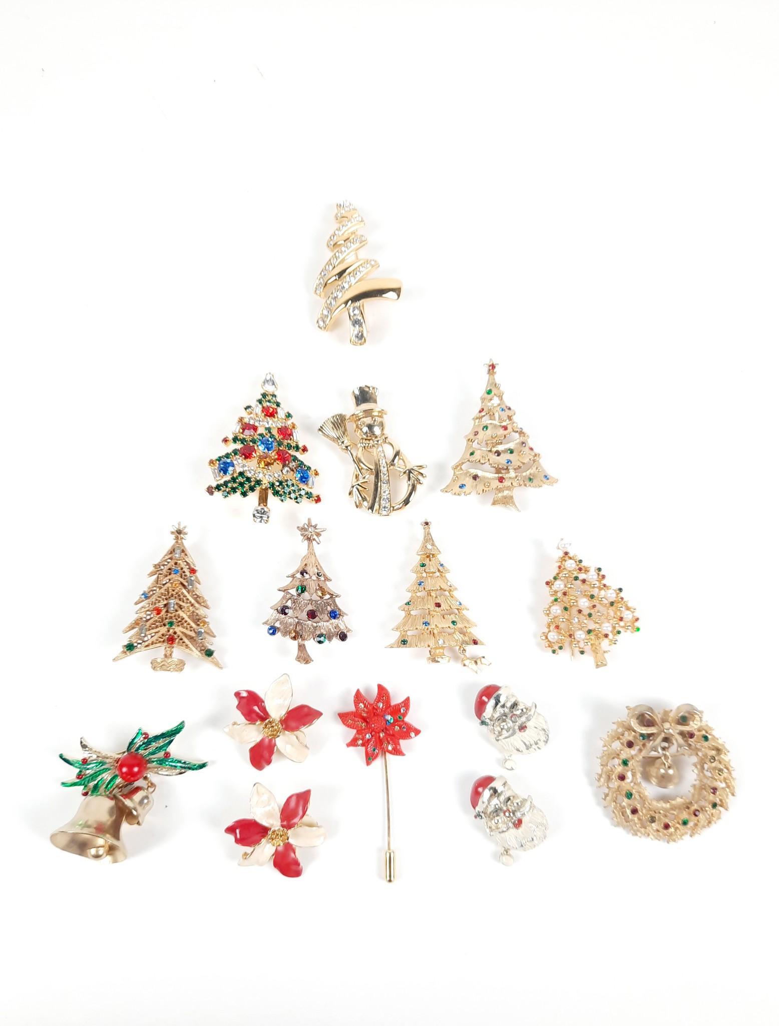 15 Christmas Brooches, Earrings and Stick Pin: 1" to 2-3/4" high. Includes Mack Truck dog / tree brooch, Art Co, CTC Co., and Monet. LR IMPORTANT: Before bidding, please read the terms and conditions. When you registered for the auction you agreed