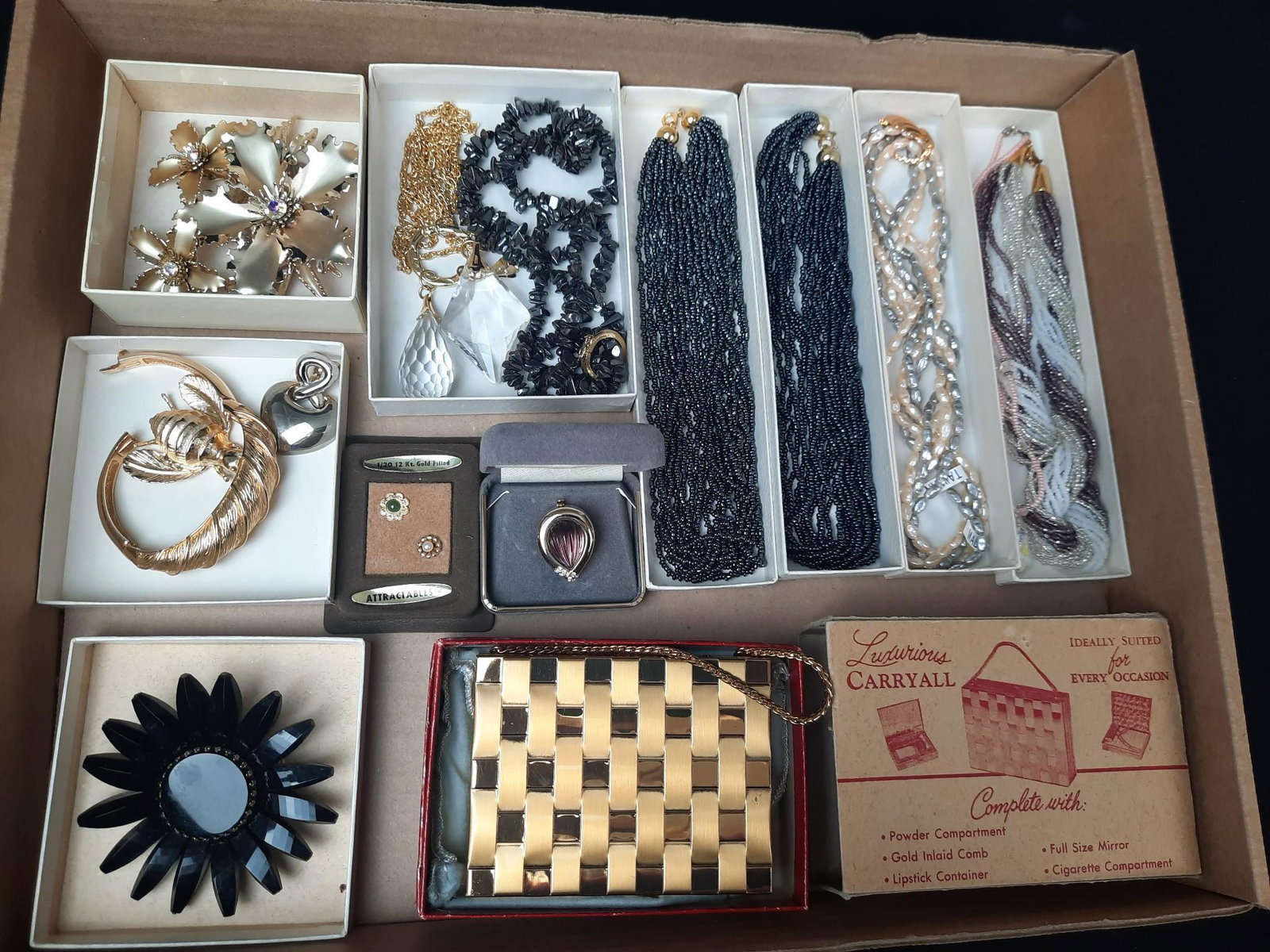 Grouping of Vintage Jewelry incl Monet: Also includes beaded. LR IMPORTANT: Before bidding, please read the terms and conditions. When you registered for the auction you agreed to these terms and will be required to comply with them.