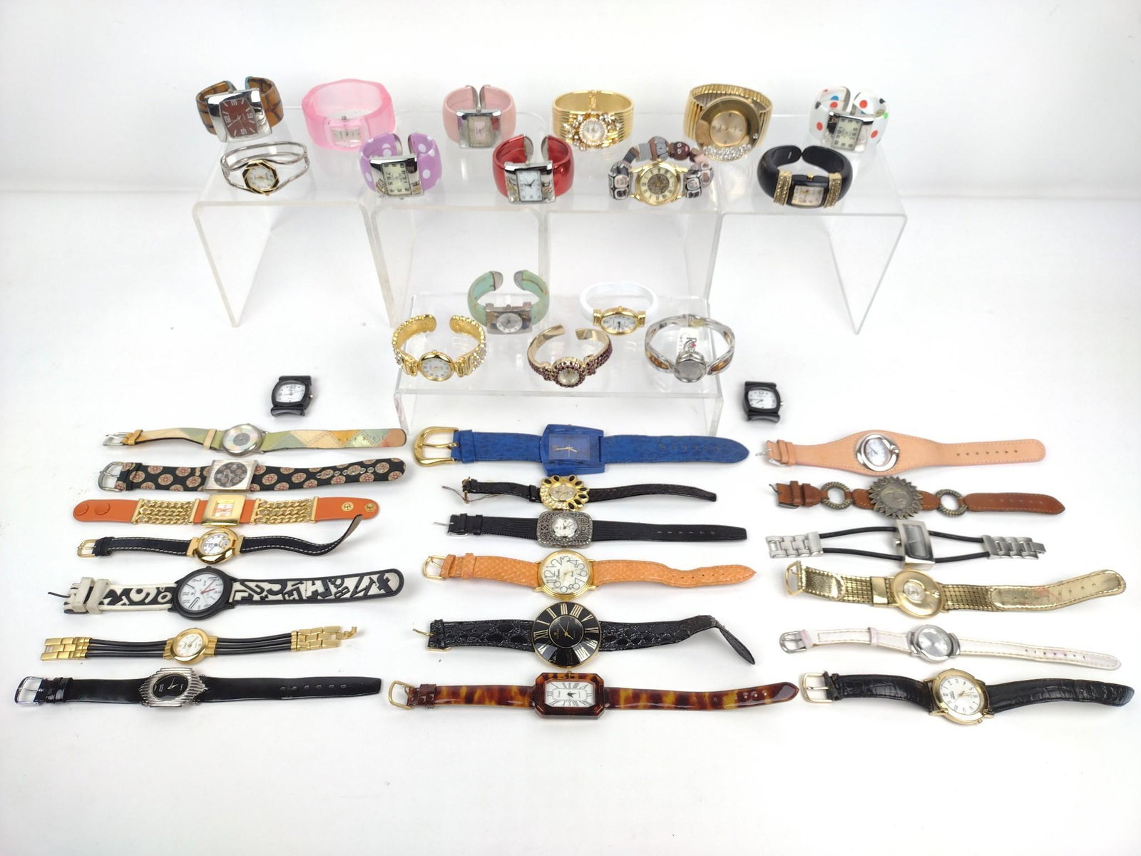 Lot Of 37 Wrist Watches: Including Vivani, Geneva, Persona, and more. MG. IMPORTANT: Before bidding, please read the terms and conditions. When you registered for the auction you agreed to these terms and will be required to 
