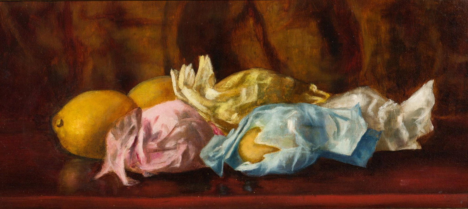 Still Life of Fruit Oil on Canvas: DESCRIPTION: Still life of lemons, some wrapped and some not. Oil on canvas. Unsigned. Faded stamp to back of canvas. In ornate gilt frame. MEASUREMENTS: 8-5/8" high x 19-5/8" wide; frame 2-1/4" wide.