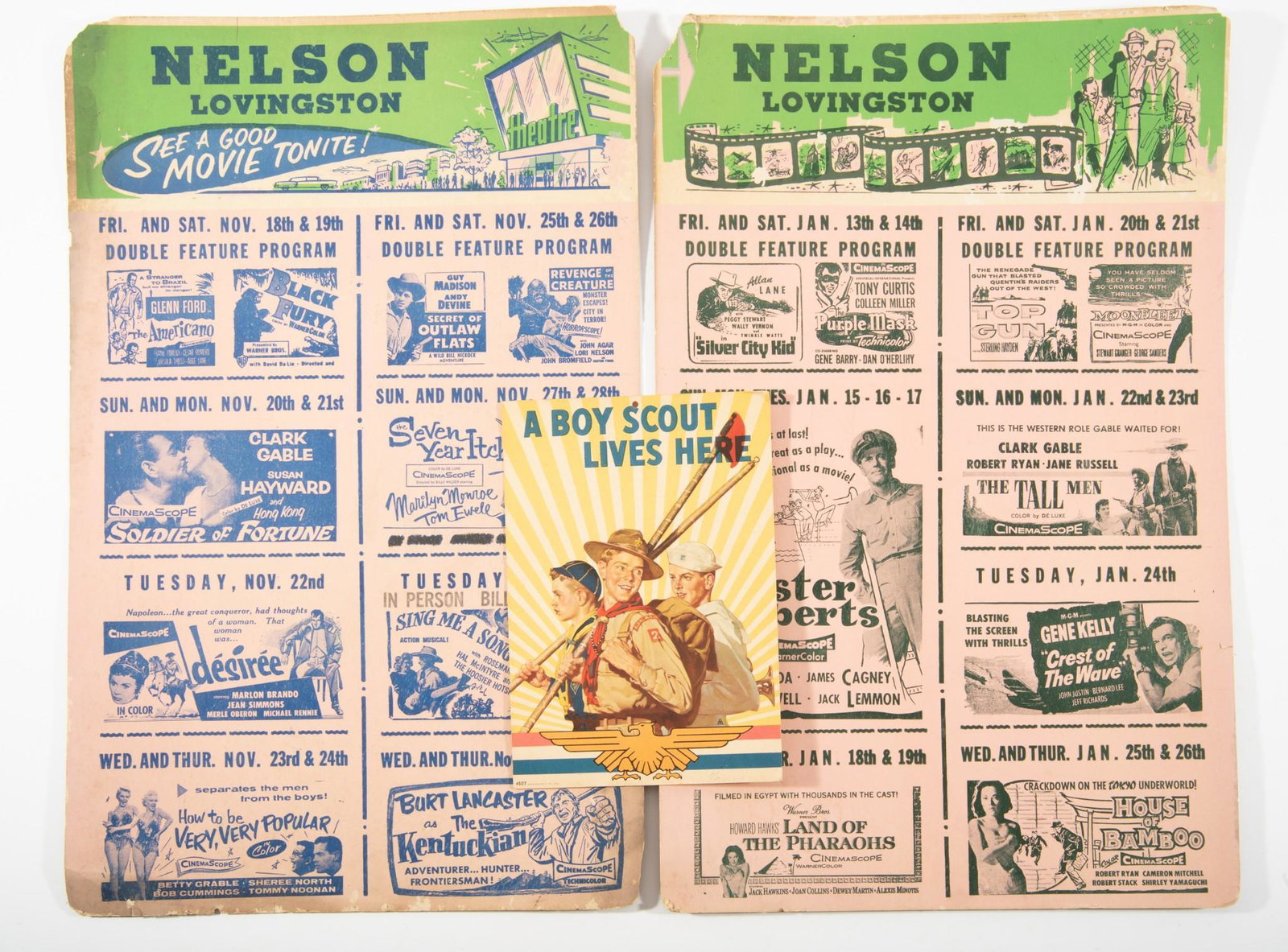 3 BSA and Nelson Lovingston Posters: Includes a vintage window poster "A Boy Scout Lives Here" printed by Brown & Bigelow. Also includes two vintage Nelson-Lovingston theater posters circa 1955. Includes listings for The Seven Year Itch,