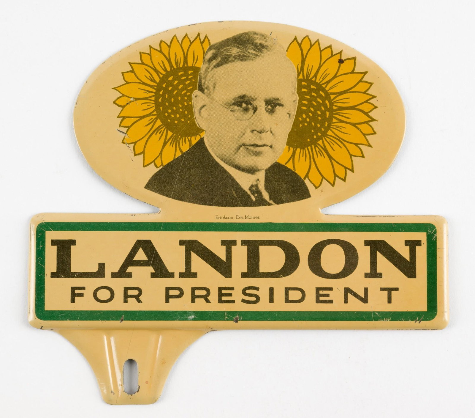 Landon for President License Plate Topper: Also marked Erickson, Des Moines. 6-1/4" wide x 5-3/4" high. Some wear and paint loss. RM IMPORTANT: Before bidding, please read the terms and conditions. When you registered for the auction you agree