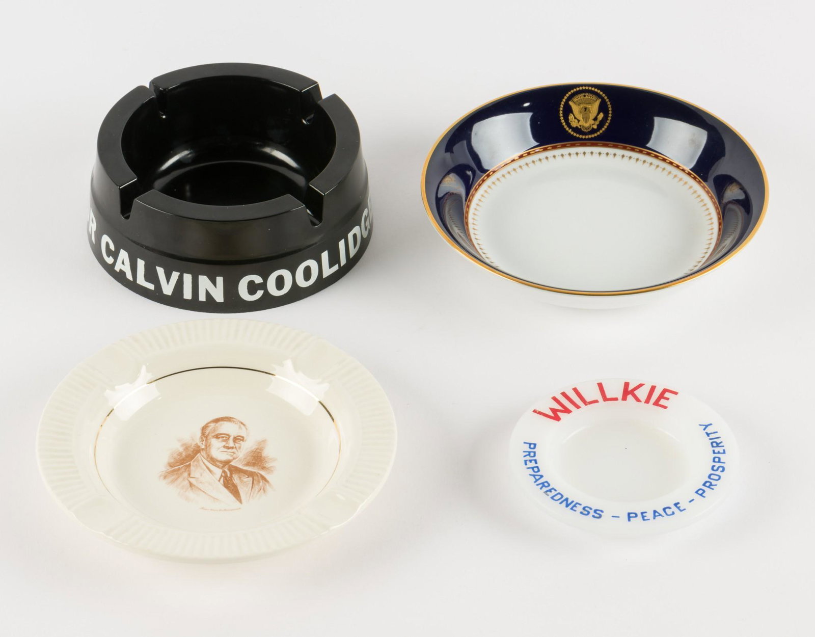 4 Political Ashtrays and Bowls: Four political ashtrays. "Willkie Preparedness Peace Prosperity", white ceramic with portrait of Franklin D. Roosevelt in brown and to bottom "Souvenir The Little White House Warm Springs. GA.", blue 