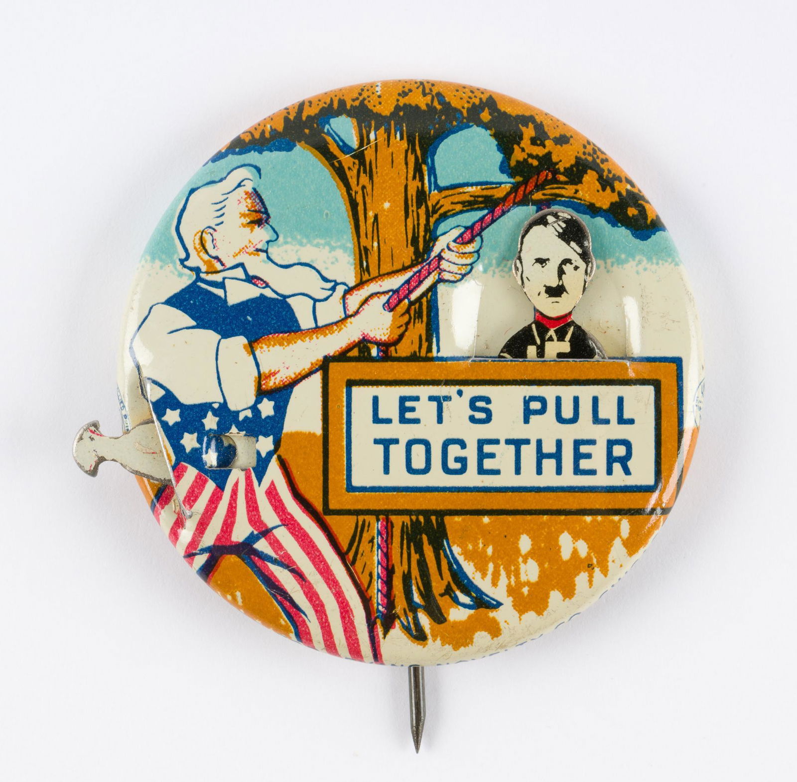 WWII Novelty Mechanical Pinback: Novelty mechanical pinback with image of Uncle Sam pulling the rope to hang Hitler from a true. Text reads "Let's Pull Together". Tab to left side can be pulled to allow Hitler's head to go up and dow