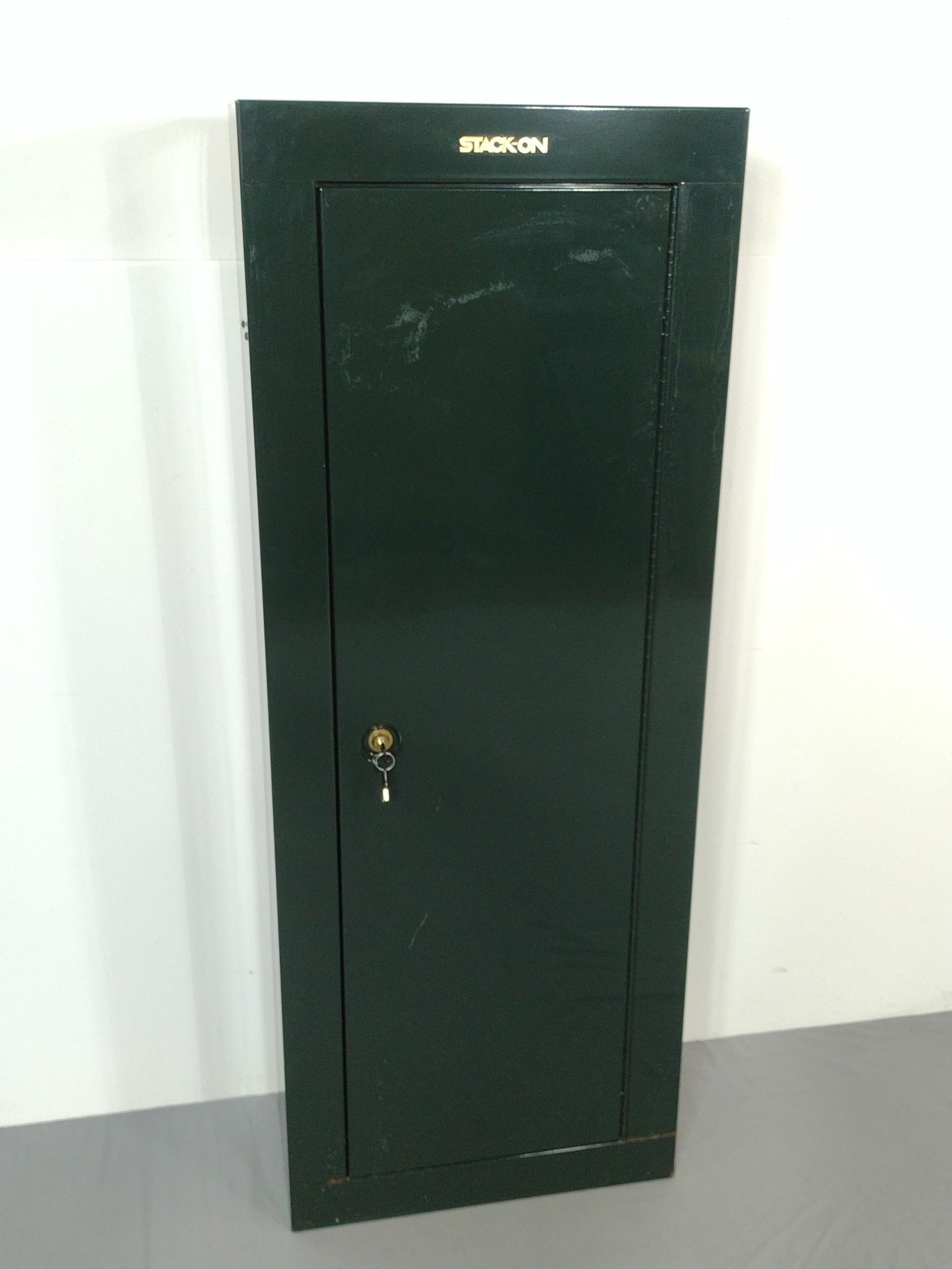 Stack-On Gun Safe: Has key. 21" wide X 10" deep X 55" high. Has some scratches and finish loss. Has rack for 8 long guns. MG. IMPORTANT: Before bidding, please read the terms and conditions. When you registered for the