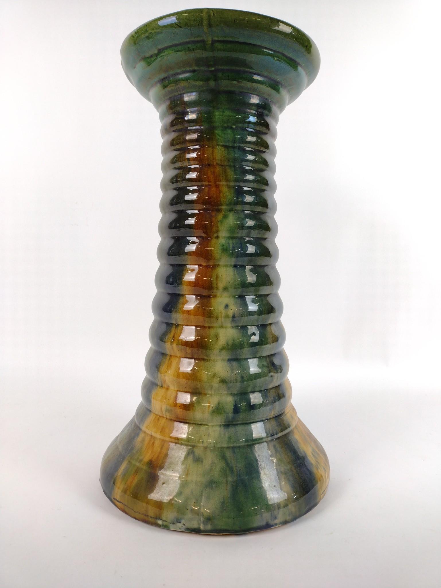 18-1/2 Majolica Pedestal: Unmarked. 10" diameter x 18-1/" high. JB IMPORTANT: Before bidding, please read the terms and conditions. When you registered for the auction you agreed to these terms and will be required to comply w