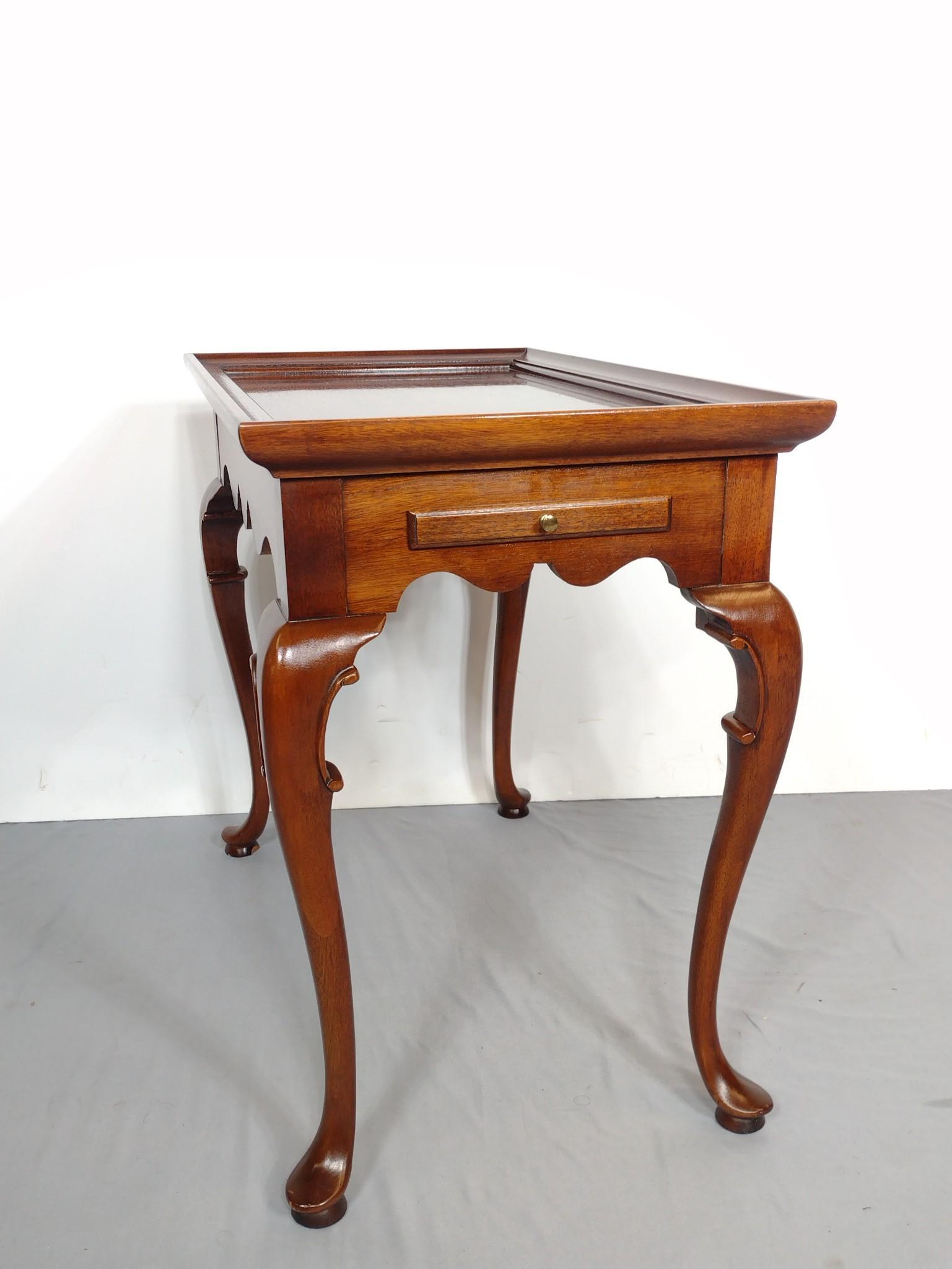 Queen Anne Style Tea Table: 18" wide X 30" deep X 26-3/4" high. No manufactures name found. MG. IMPORTANT: Before bidding, please read the terms and conditions. When you registered for the auction you agreed to these terms and w