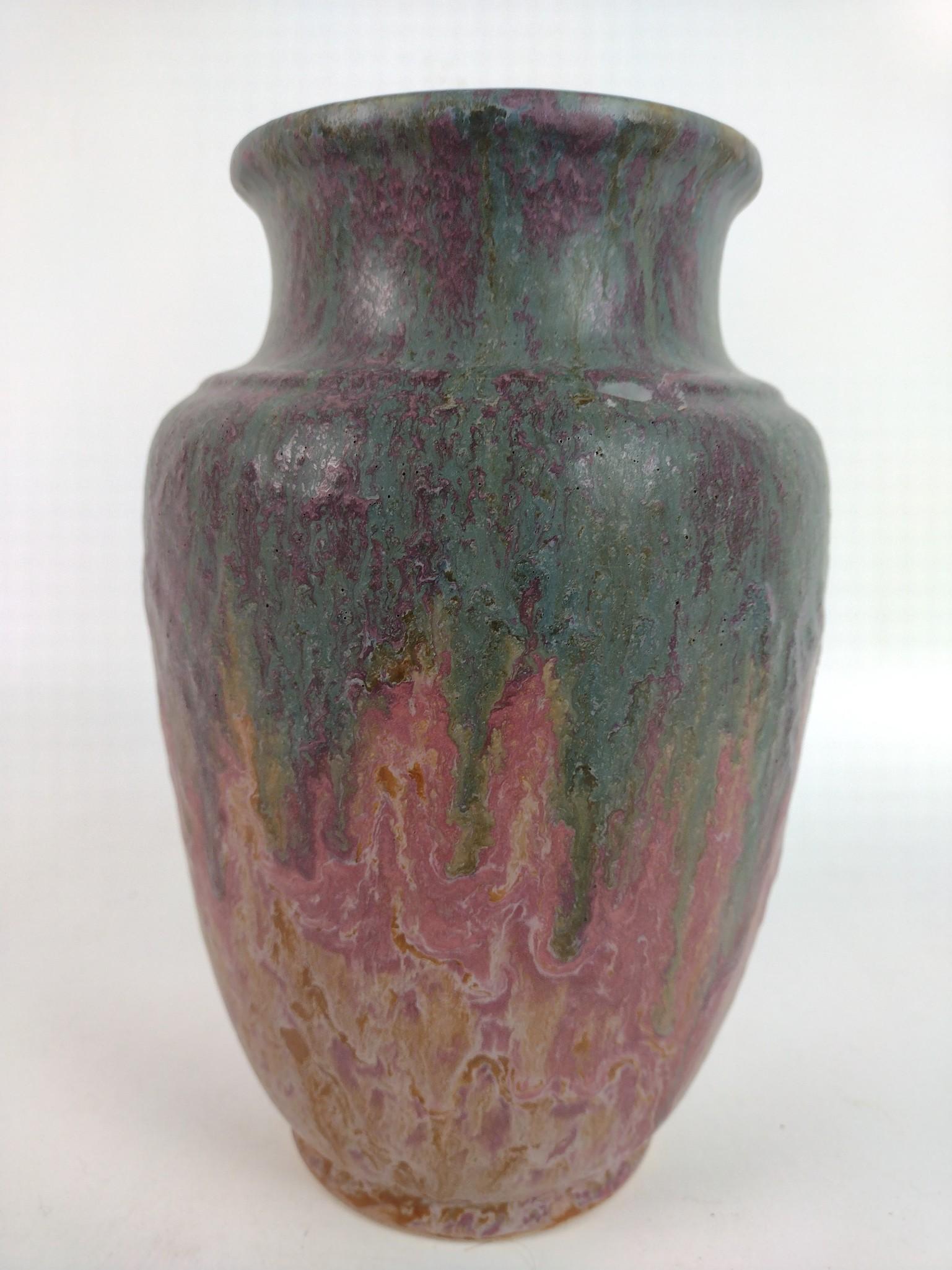 9" Roseville Carnelian Vase: Unmarked. 6" diameter x 9" high. JB IMPORTANT: Before bidding, please read the terms and conditions. When you registered for the auction you agreed to these terms and will be required to comply with t