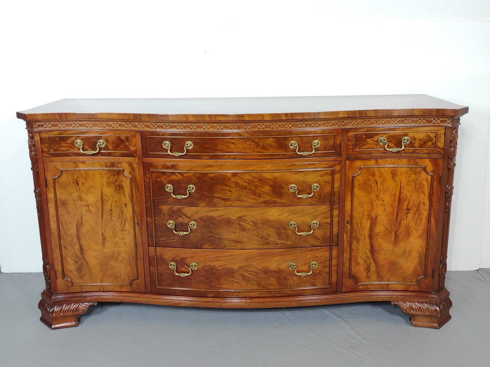 Mahogany Sideboard: 67-1/2" wide X 21-1/2" deep X 35" high. No manufactures name found. MG. IMPORTANT: Before bidding, please read the terms and conditions. When you registered for the auction you agreed to these terms a