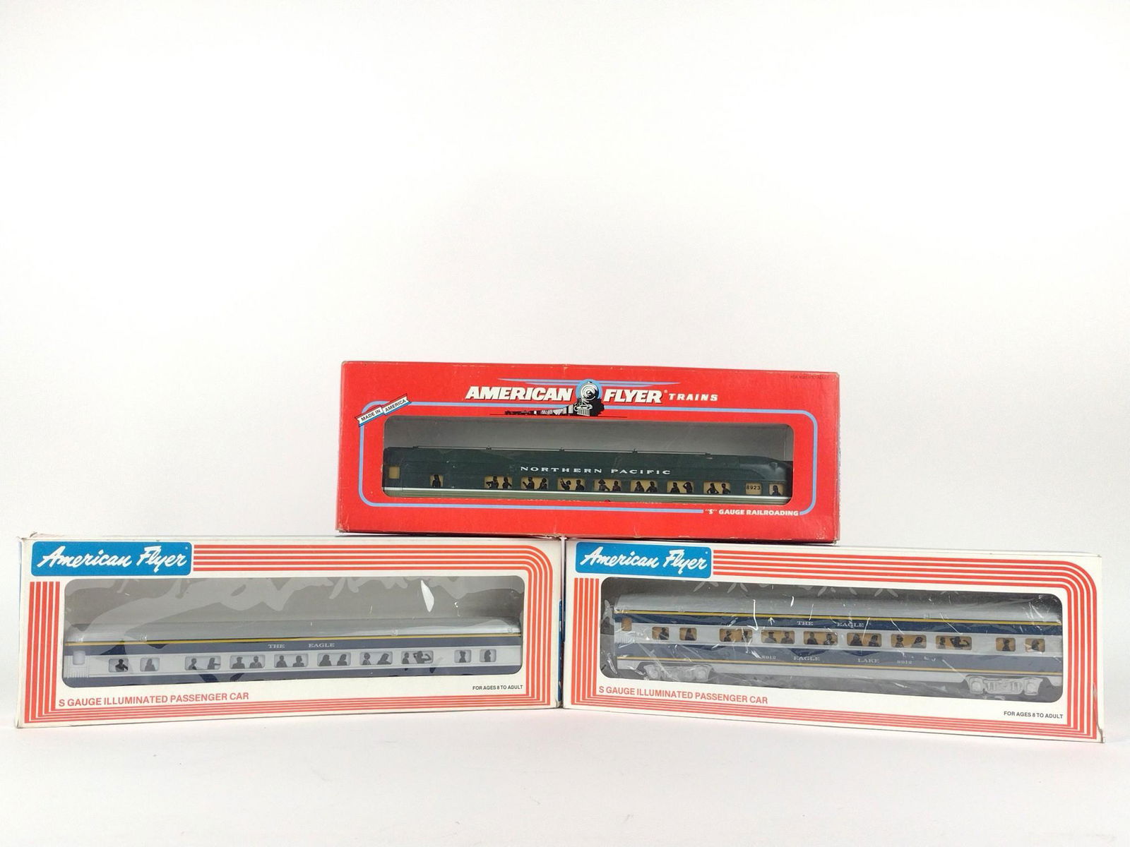 3 American Flyer S Gauge Passenger Cars w/OBs: Includes Northern Pacific Passenger Coach 6-48925, Missouri Pacific "Eagle Hill" Combo Car 6-48910, and Missouri Pacific "Eagle View" Vista Dome Car 6-48915. Some wear to boxes. Have been run. DP. IMP