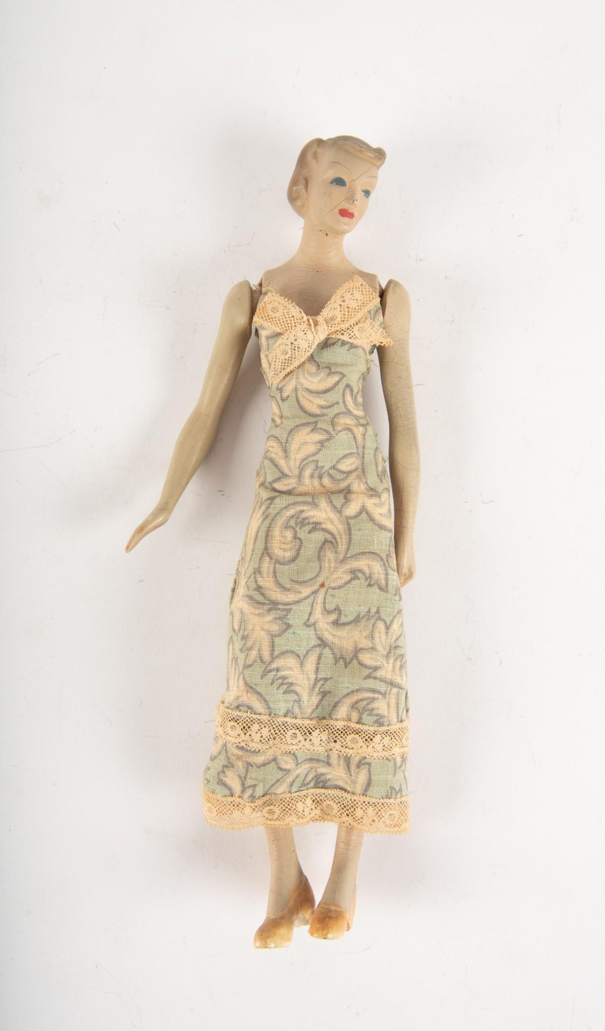 Vintage 1940s Simplicity/Butterick Fashion Doll: Latexture Products. In hand sewn dress. Allover crazing. 12" tall. MH. IMPORTANT: Before bidding, please read the terms and conditions. When you registered for the auction you agreed to these terms an