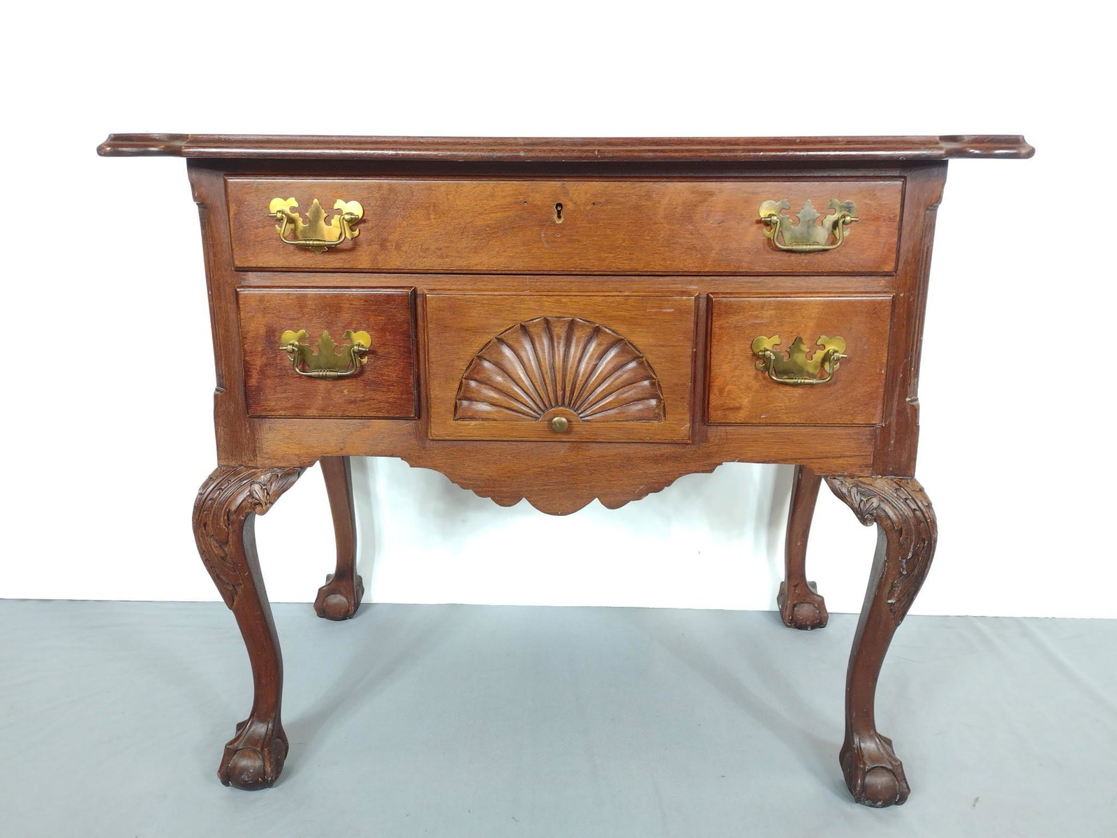 Low Boy With Ball & Claw Feet: Chippendale style. 35" wide X 21-1/2" deep X 30" high. Top has scratches and finish loss. Feet have some scratches. MG. IMPORTANT: Before bidding, please read the terms and conditions. When you regist