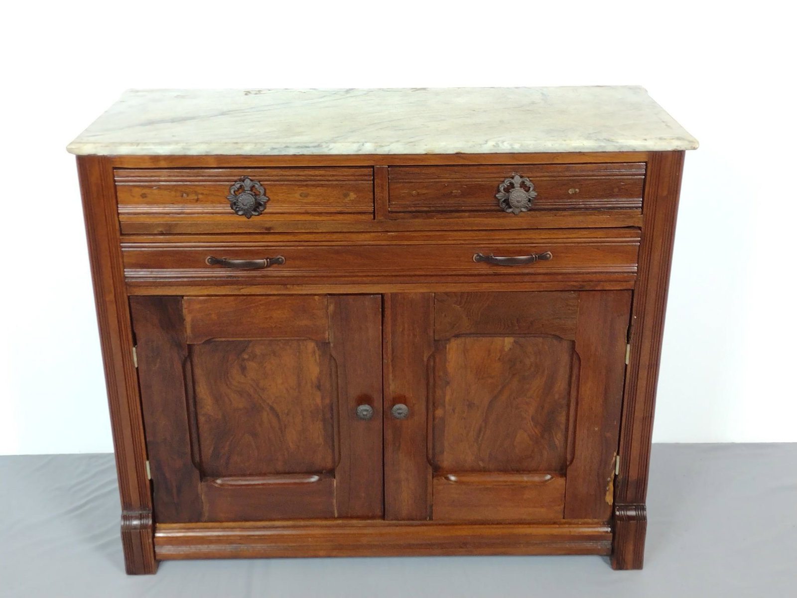 Marble Top Cabinet: 42" wide X 17" deep X 34-1/2" high. Has some scratches. MG. IMPORTANT: Before bidding, please read the terms and conditions. When you registered for the auction you agreed to these terms and will be r