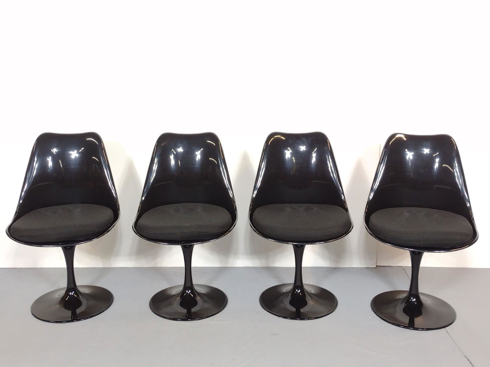 4 Stairway Tulip Chairs: Lucite with metal chair bases. 19" wide X 19" deep X 31-1/2" high. MG. IMPORTANT: Before bidding, please read the terms and conditions. When you registered for the auction you agreed to these terms an