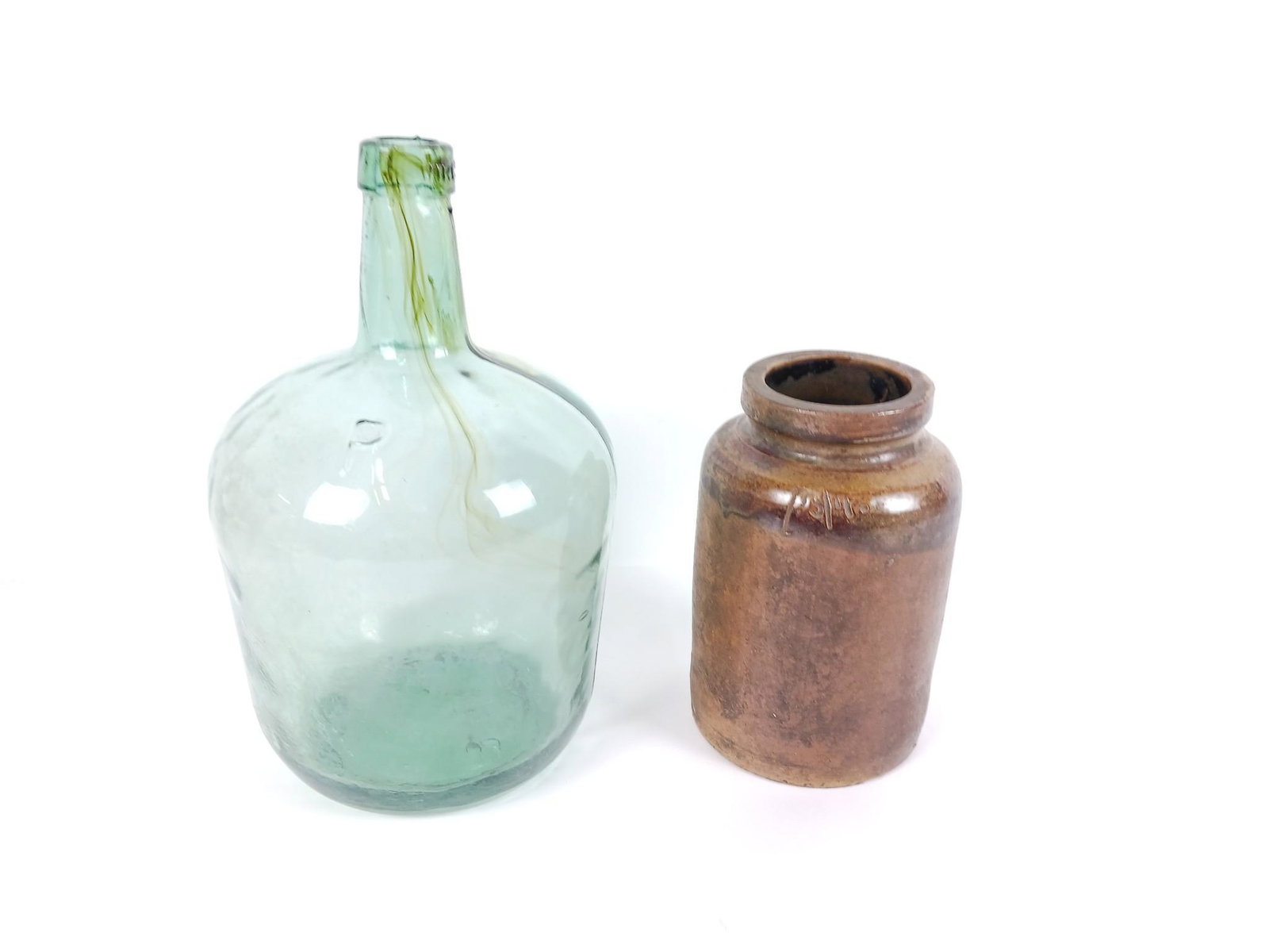 1-3/4 Stoneware Jar and Viresa Blown Bottle: 5" to 7-1/2" diameter x 8" to 12-1/2" high. LR IMPORTANT: Before bidding, please read the terms and conditions. When you registered for the auction you agreed to these terms and will be required to co