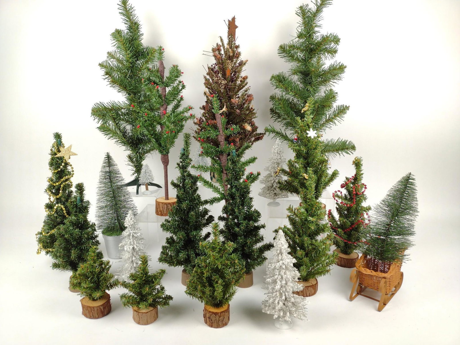 23 Vintage Christmas Trees: 5" high to 24" high. Jb IMPORTANT: Before bidding, please read the terms and conditions. When you registered for the auction you agreed to these terms and will be required to comply with them.