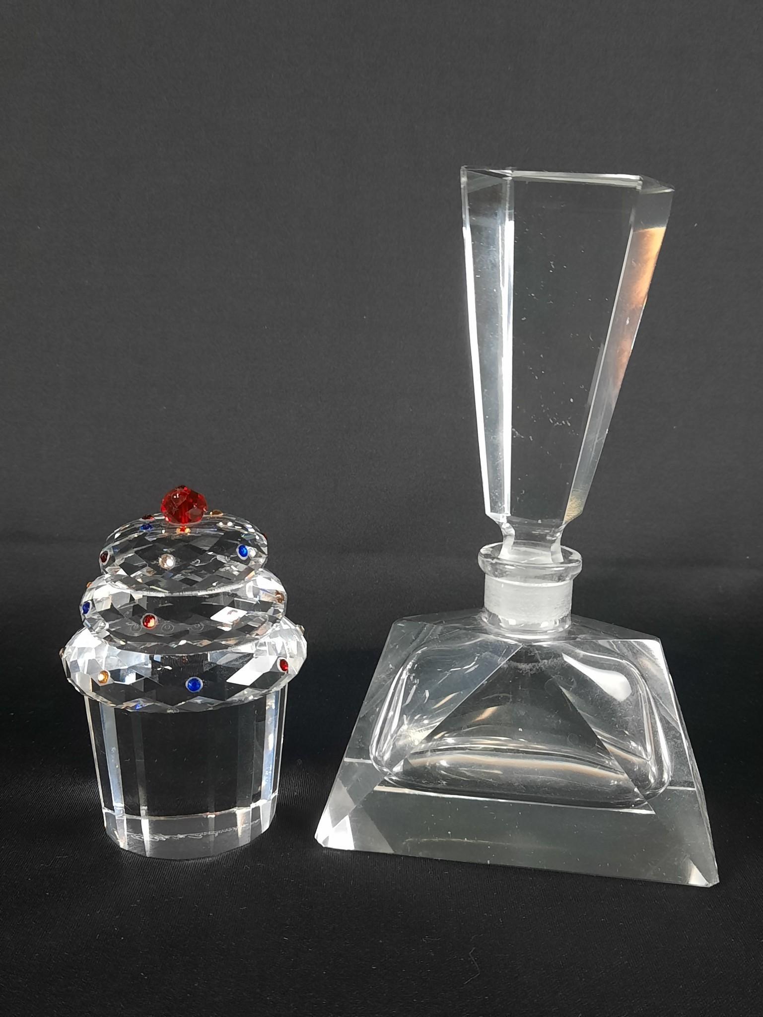 Pefume Bottle and Oleg Cassini Cupcake Paperweight: Bottle unmarked. 3-1/2" to 6-1/4" high. LR IMPORTANT: Before bidding, please read the terms and conditions. When you registered for the auction you agreed to these terms and will be required to comply