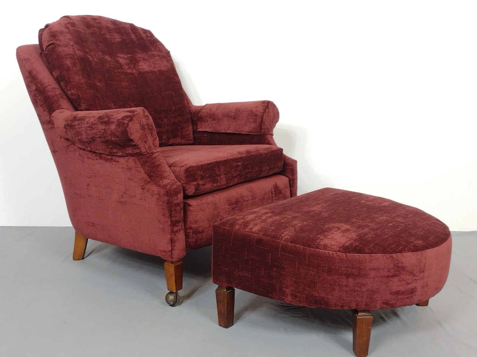 Burgundy Upholstered Arm Chair & Ottoman: Chair 32" wide X 32" deep X 36" high. Ottoman 25-1/2" wide X 20" deep X 12" high. No manufactures name found. MG. IMPORTANT: Before bidding, please read the terms and conditions. When you registered f
