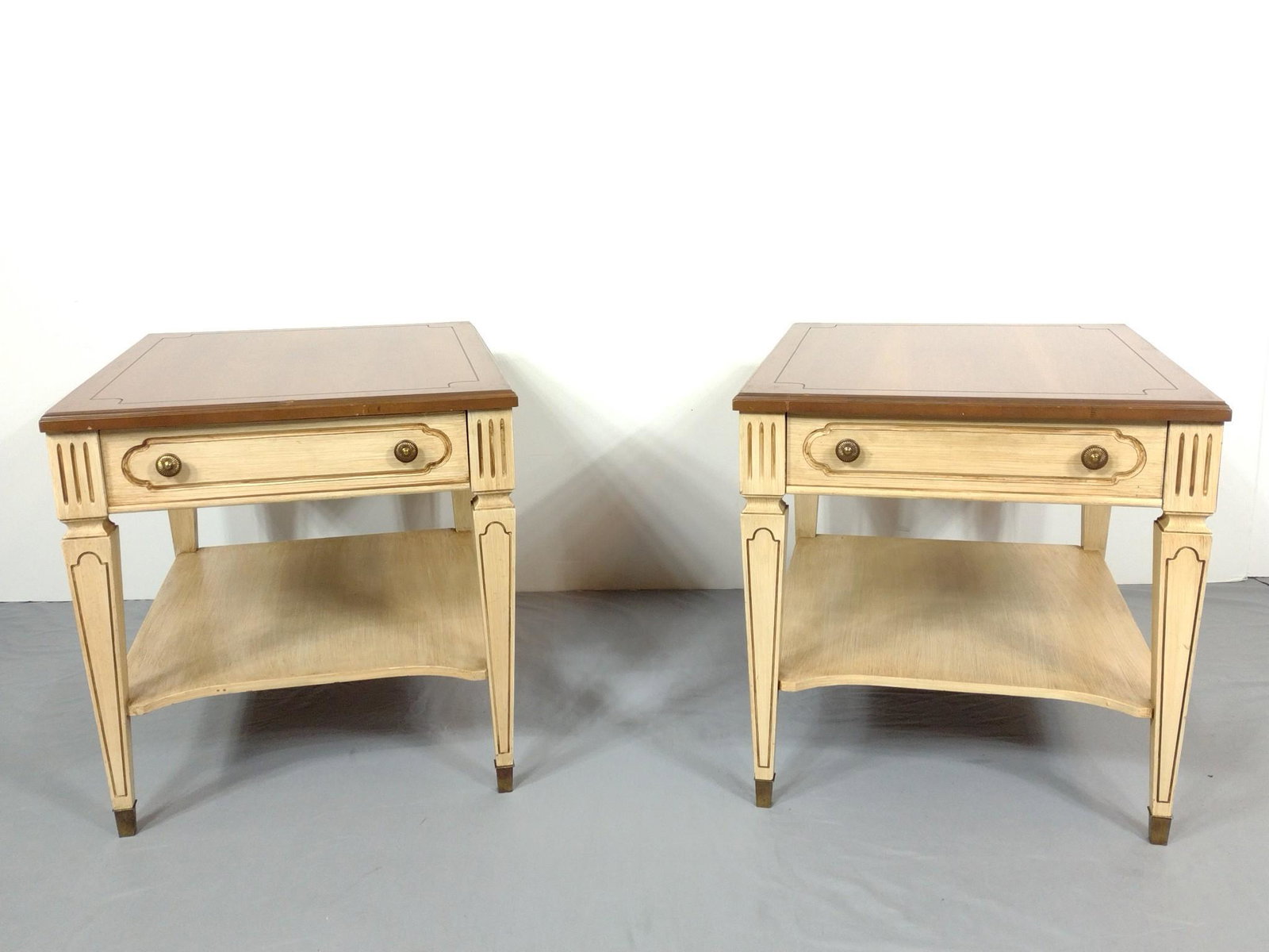2 Mersman End Tables: 21" wide X 28" deep X 21-1/4" high. Both have a few scratches. MG. IMPORTANT: Before bidding, please read the terms and conditions. When you registered for the auction you agreed to these terms and wi