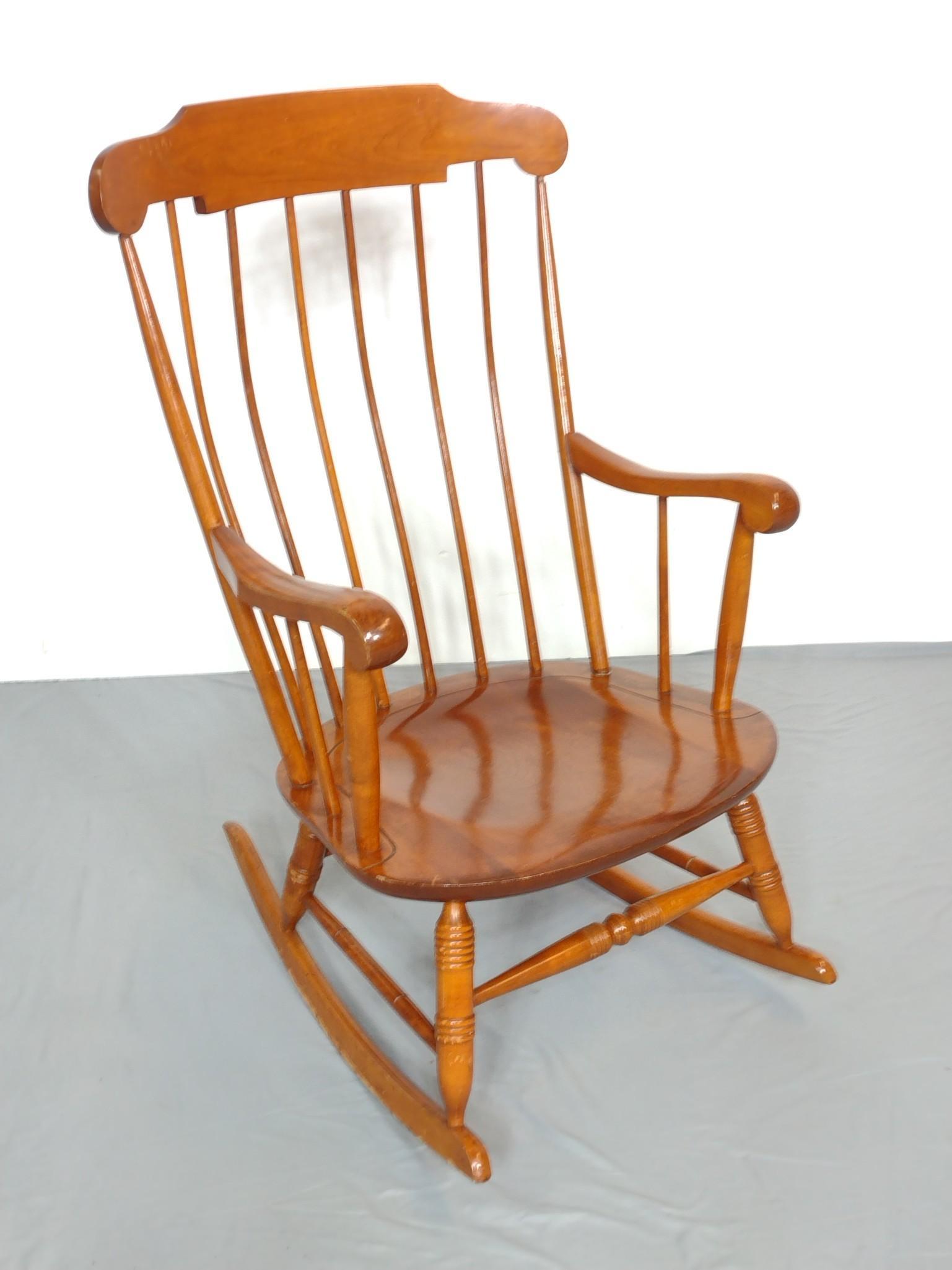 Nichols and Stone Rocker: 22" wide X 19-1/2" deep X 40" high. Has a few light scratches. MG. IMPORTANT: Before bidding, please read the terms and conditions. When you registered for the auction you agreed to these terms and wi