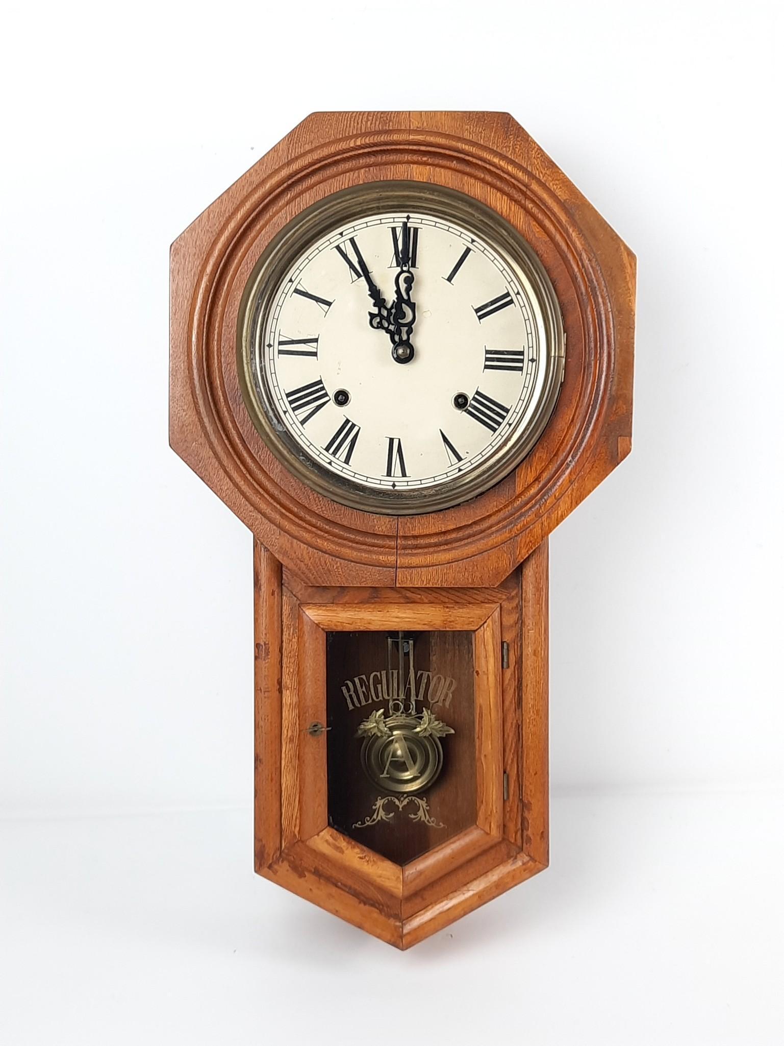 Regulator A Wall Clock: Starts and stops. 12-1/4" wide x 5" deep x 22-1/4" high. LR IMPORTANT: Before bidding, please read the terms and conditions. When you registered for the auction you agreed to these terms and will be r