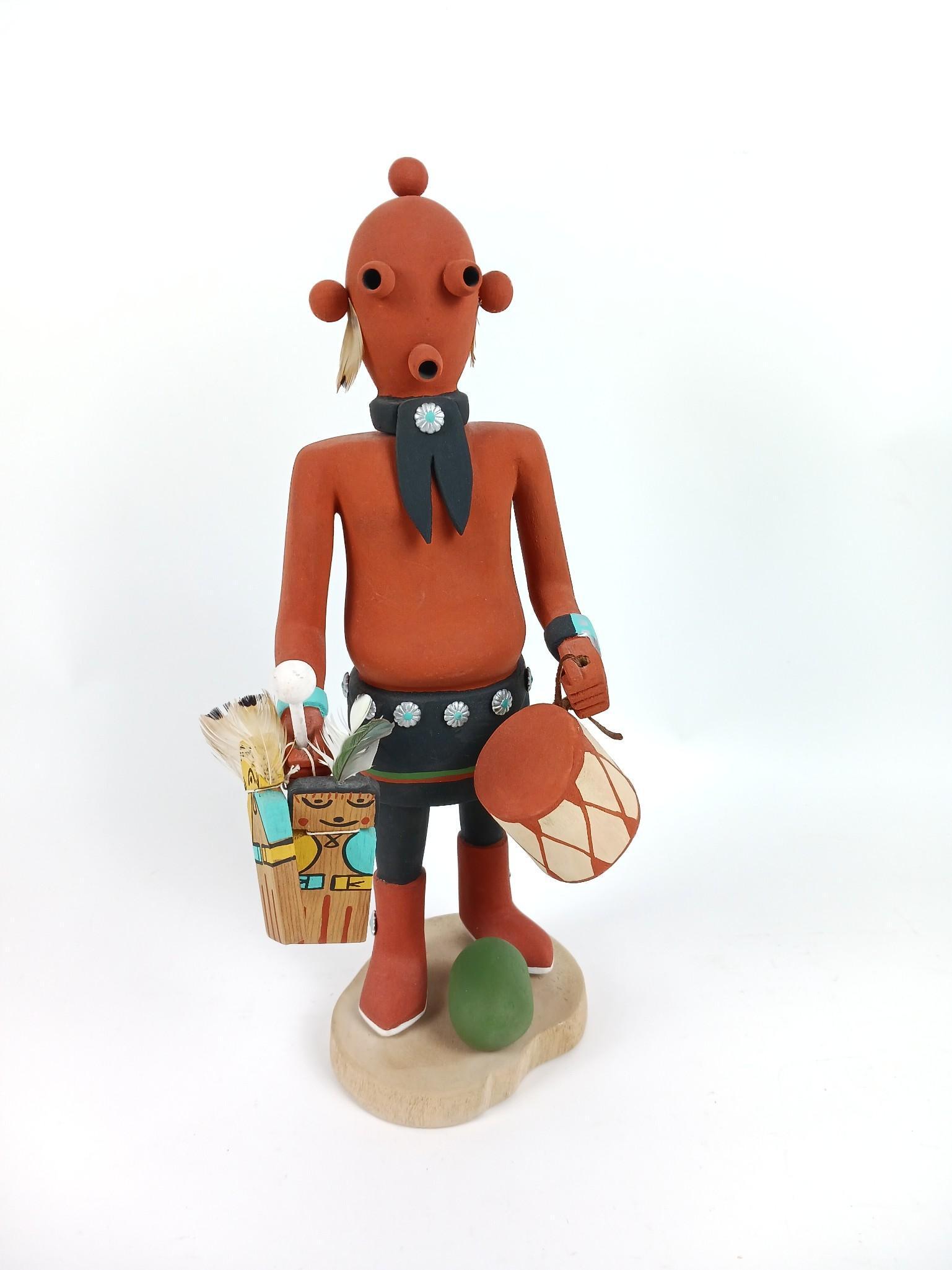 Mud Head Drummer Kachina by Yellow Bear Hopi: 7" wide x 6" deep x 15" high. LR IMPORTANT: Before bidding, please read the terms and conditions. When you registered for the auction you agreed to these terms and will be required to comply with them