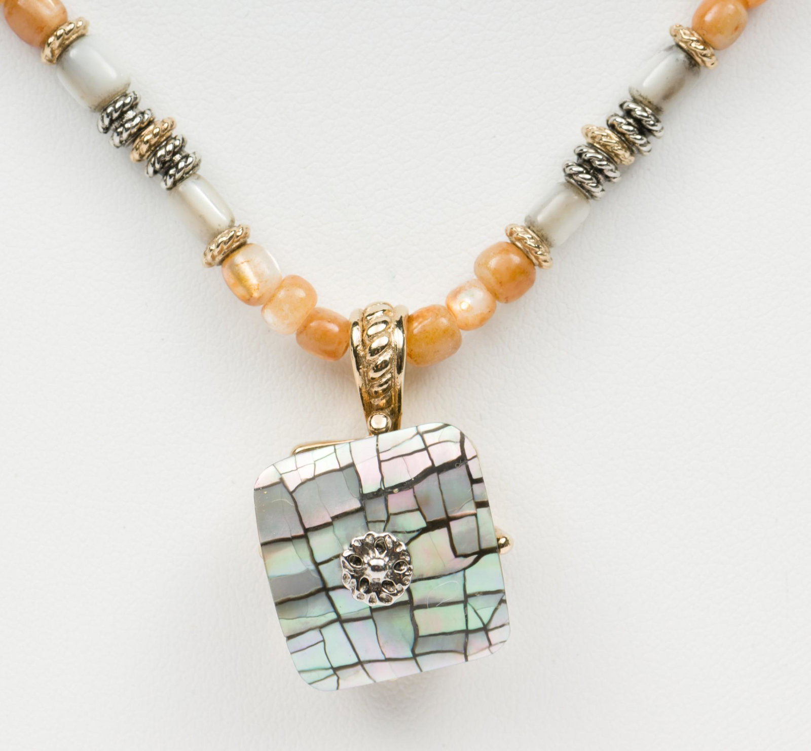 LC Pendant Necklace: Pendant necklace with gold-filled chain and beads. 18" long. EK IMPORTANT: Before bidding, please read the terms and conditions. When you registered for the auction you agreed to these terms and will 
