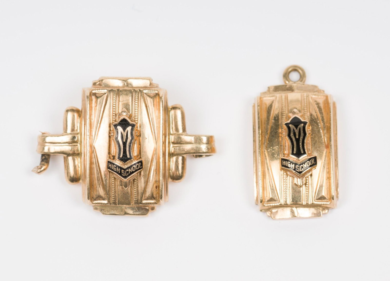 10K Gold High Society Pendant and Link: Tested 10k gold. 4.4 dwt. 5/8" and 1/2". EK IMPORTANT: Before bidding, please read the terms and conditions. When you registered for the auction you agreed to these terms and will be required to compl