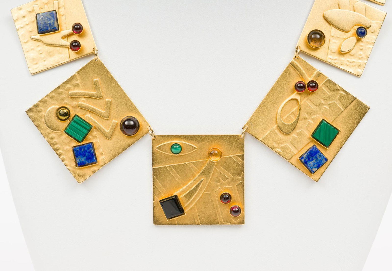 Gale Rothstein Necklace: Necklace w/ 13 square sections inlaid w/ hardstone, cabuchon and facetted stones. Vintage modernist. Signed on reverse c Gale Rothstein tm Designs, Inc. Square sections 1 1/8" x 1 3/8". Overall length