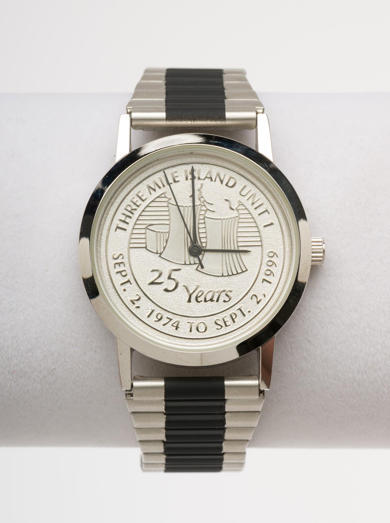 Three Mile Island Unit 1 Comm Wrist Watch: Commemorative 25 year wrist watch. Case 1-1/4" diameter. Stretch band. EK IMPORTANT: Before bidding, please read the terms and conditions. When you registered for the auction you agreed to these terms