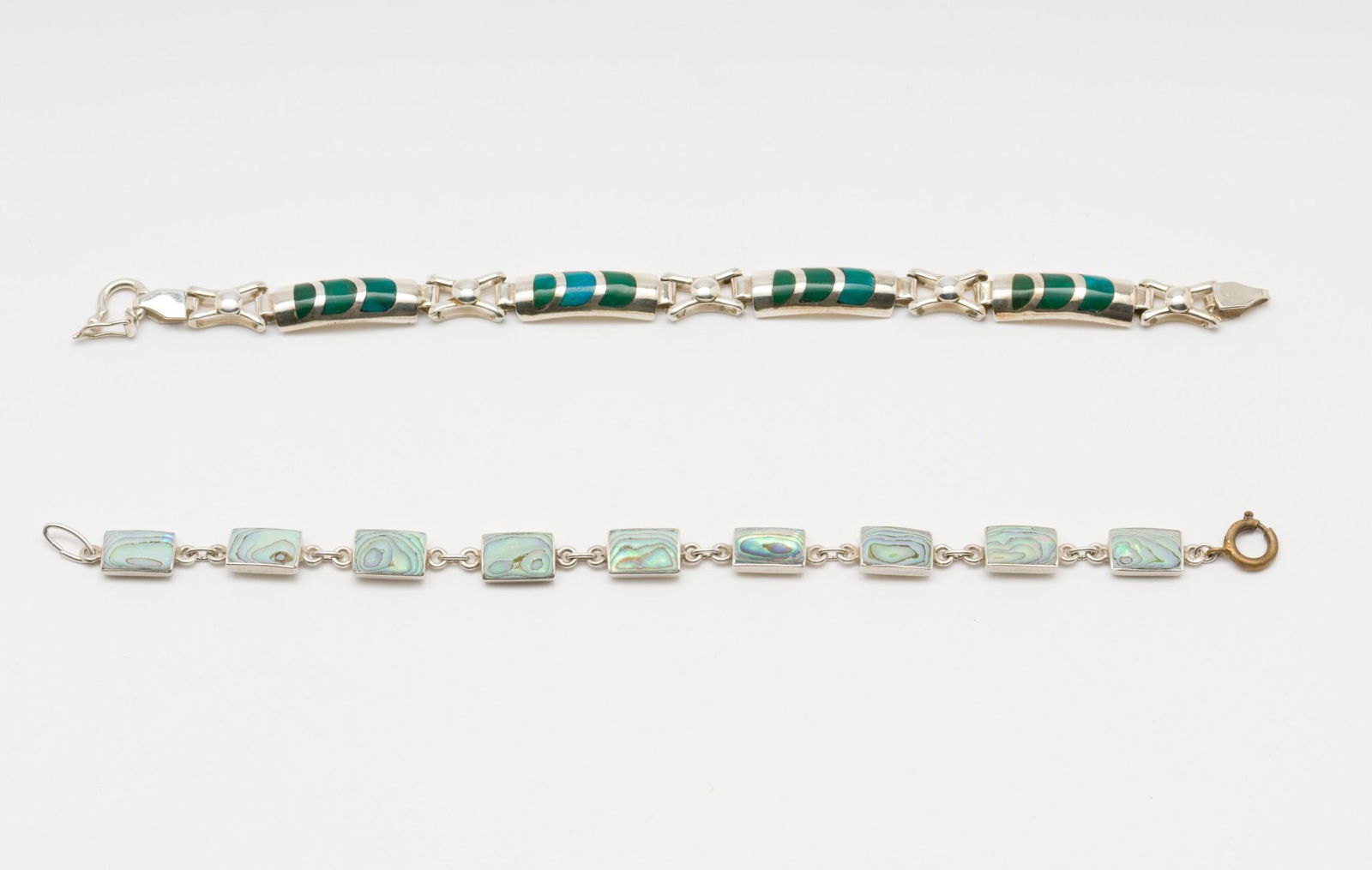 2 Sterling Bracelets: Turquoise and abalone. 6-3/4" to 7" long. EK IMPORTANT: Before bidding, please read the terms and conditions. When you registered for the auction you agreed to these terms and will be required to comp
