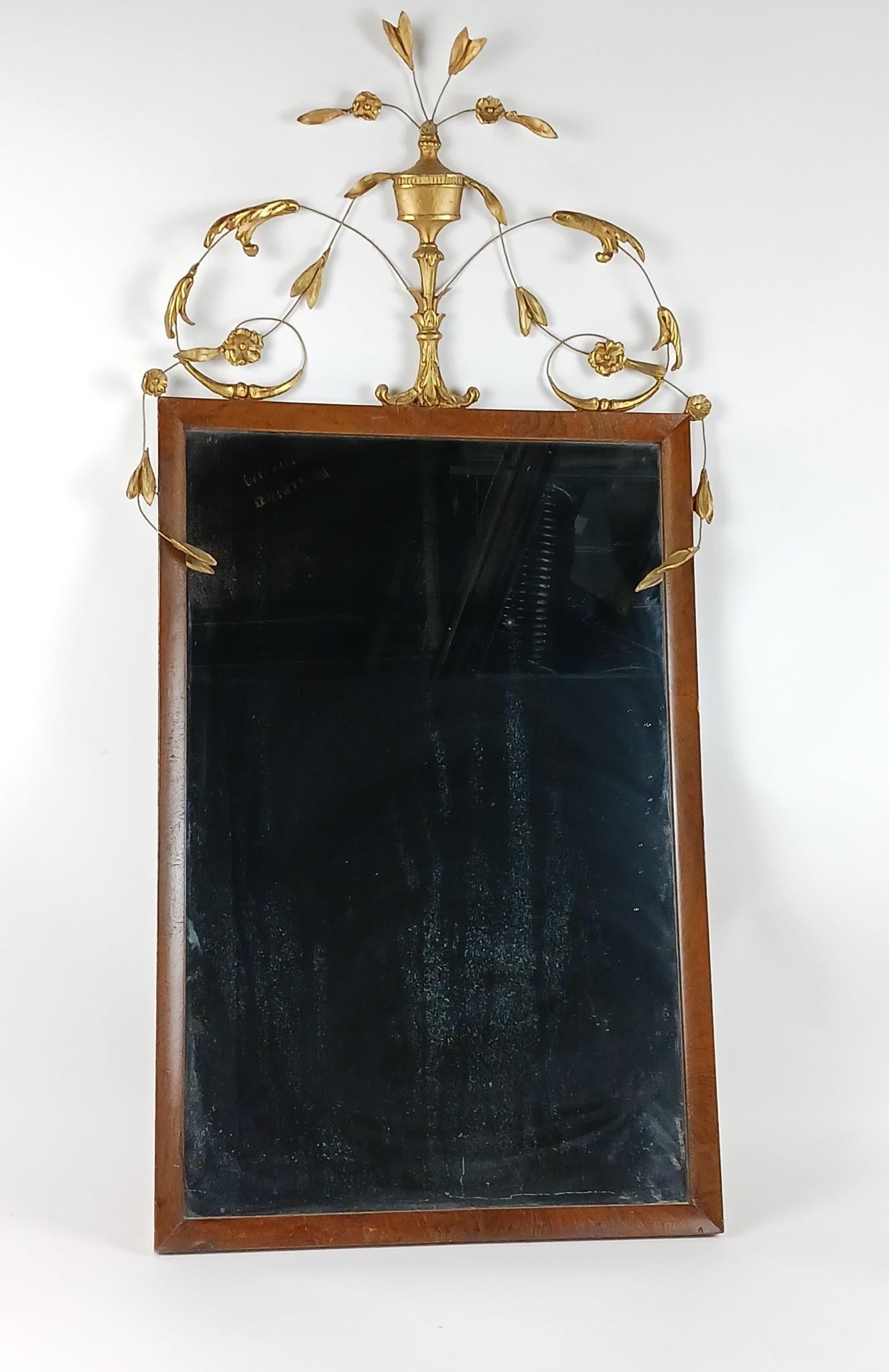 Antique Mirror with Open Work Crest: Overall 43" high x 23" wide. LR IMPORTANT: Before bidding, please read the terms and conditions. When you registered for the auction you agreed to these terms and will be required to comply with them.