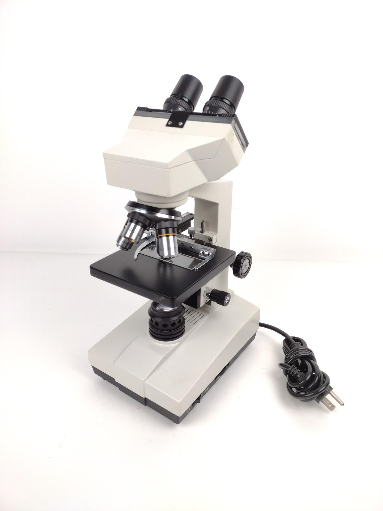 Unbranded Microscope: Magnification 4X, 10X, 40X, 100X. 6" wide X 7-1/2" deep X 14-1/2" high. Working. MG. IMPORTANT: Before bidding, please read the terms and conditions. When you registered for the auction you agreed to 