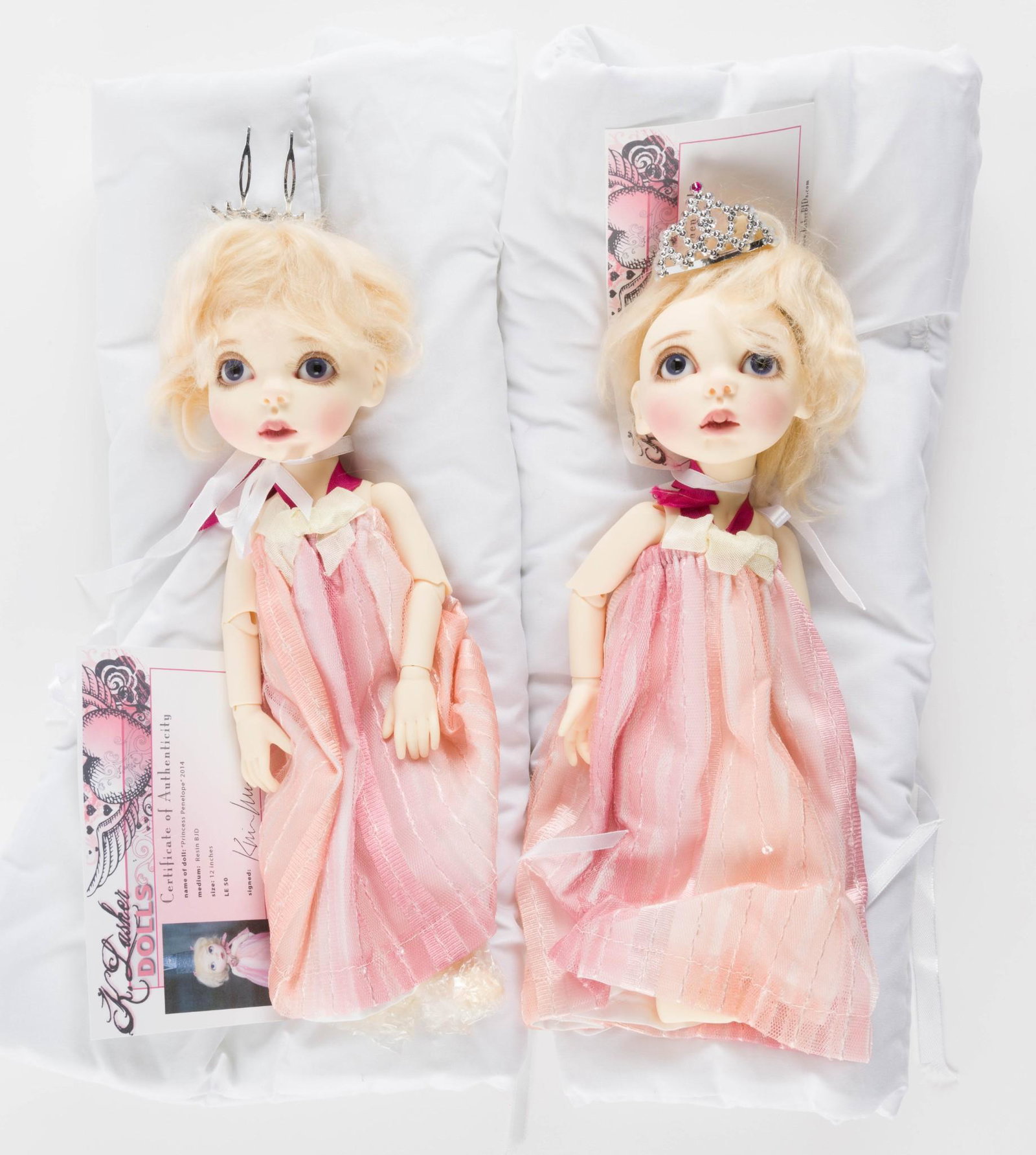 2 K. Lasher Princess Penelope Dolls: 2014. Face up, with wigs and clothing. With COAs. 12". MH. IMPORTANT: Before bidding, please read the terms and conditions. When you registered for the auction you agreed to these terms and will be re