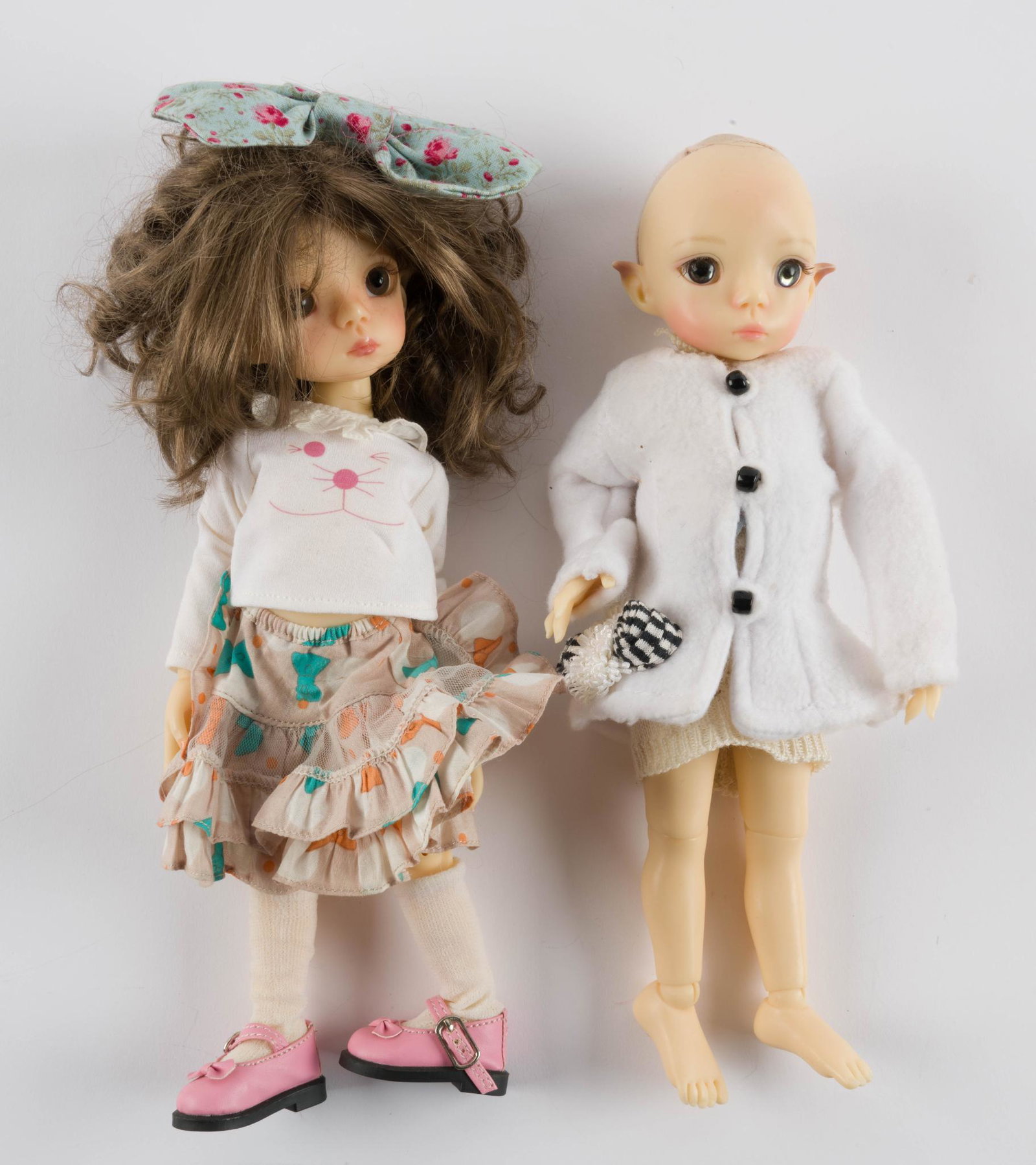 2 Linda Macario Elf Dolls: Both face up with clothing, one with wig. 11" IMPORTANT: Before bidding, please read the terms and conditions. When you registered for the auction you agreed to these terms and will be required to com