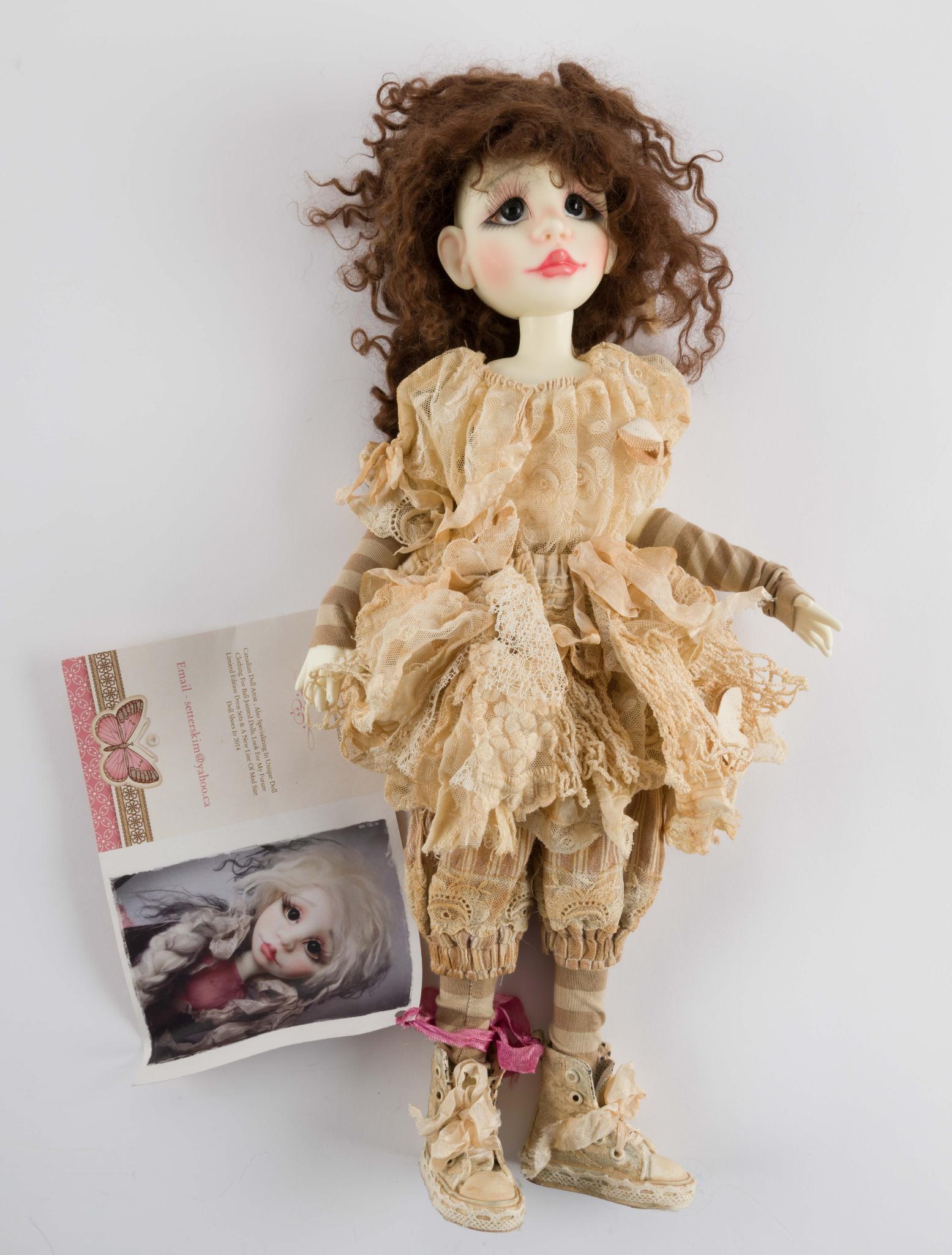 18" Kim Arnold Doll: Olivia with COA. LR IMPORTANT: Before bidding, please read the terms and conditions. When you registered for the auction you agreed to these terms and will be required to comply with them.