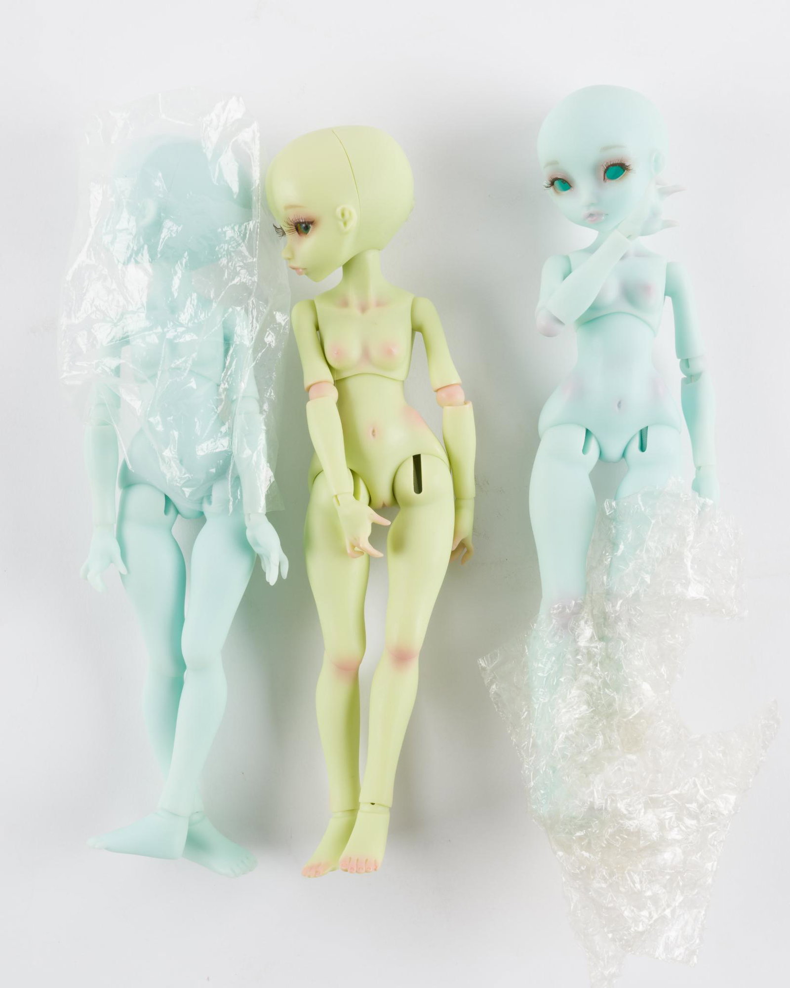 3 Rhubarb by Aselly Dolls: Two candy blue, one almond green, two with COA, face up 11". IMPORTANT: Before bidding, please read the terms and conditions. When you registered for the auction you agreed to these terms and will be 