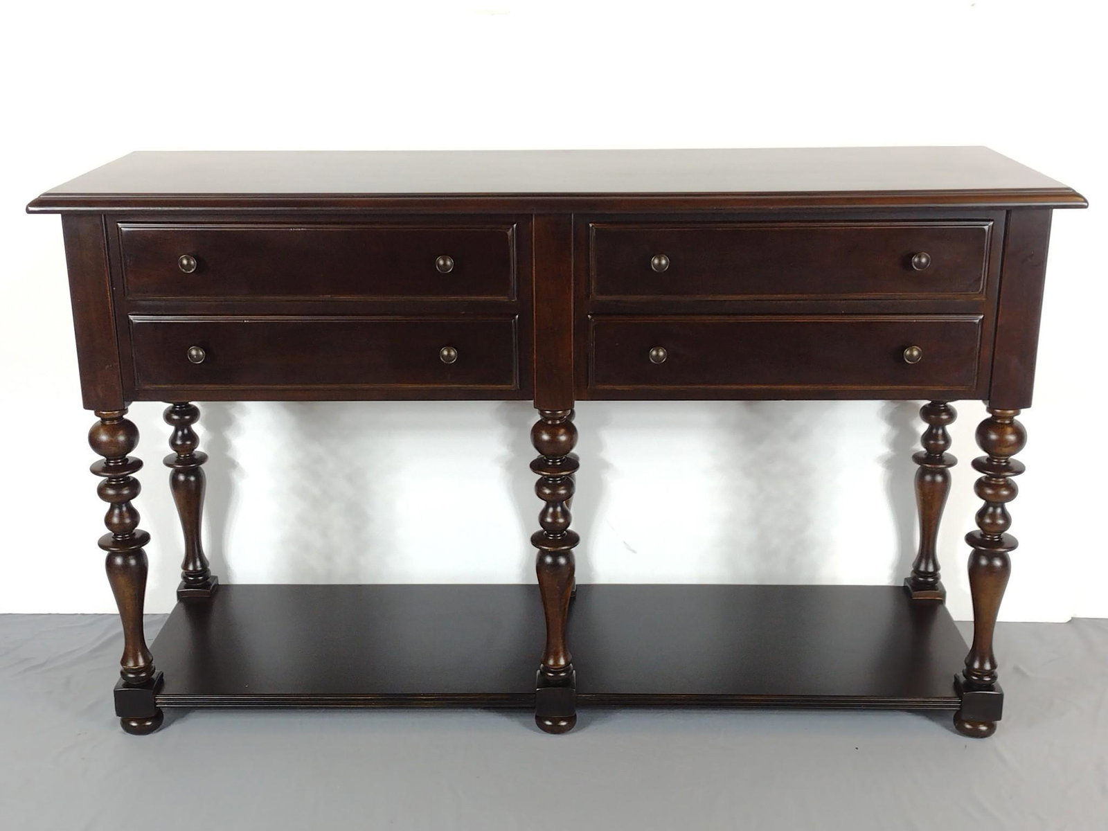 Universal Furniture Buffet: 64" wide X 20" deep X 38" high. MG. IMPORTANT: Before bidding, please read the terms and conditions. When you registered for the auction you agreed to these terms and will be required to comply with t