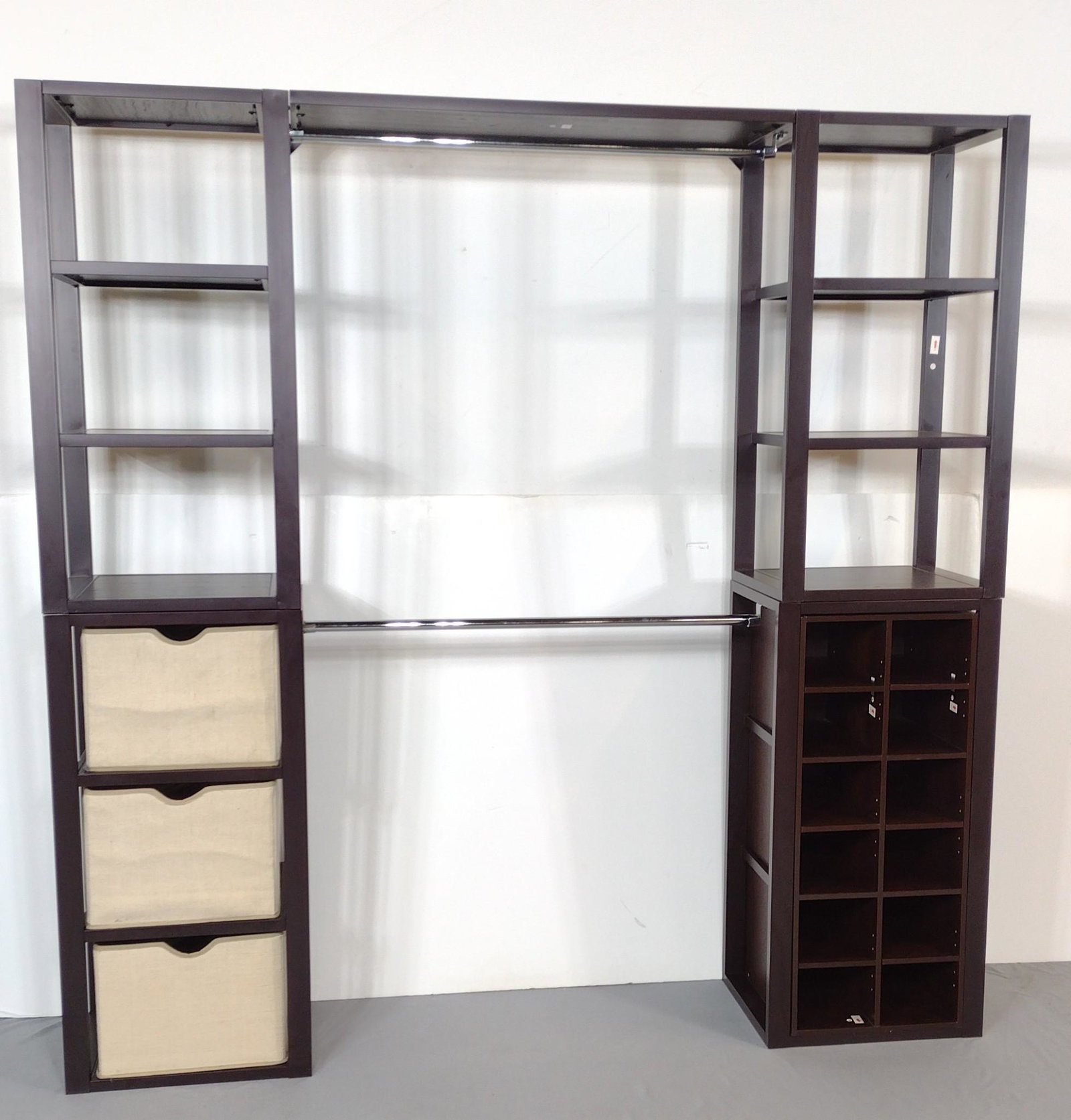 Closet Organizer System: 80-1/2" wide X 16" deep X 80" high. Has a few light scratches. MG. IMPORTANT: Before bidding, please read the terms and conditions. When you registered for the auction you agreed to these terms and wi
