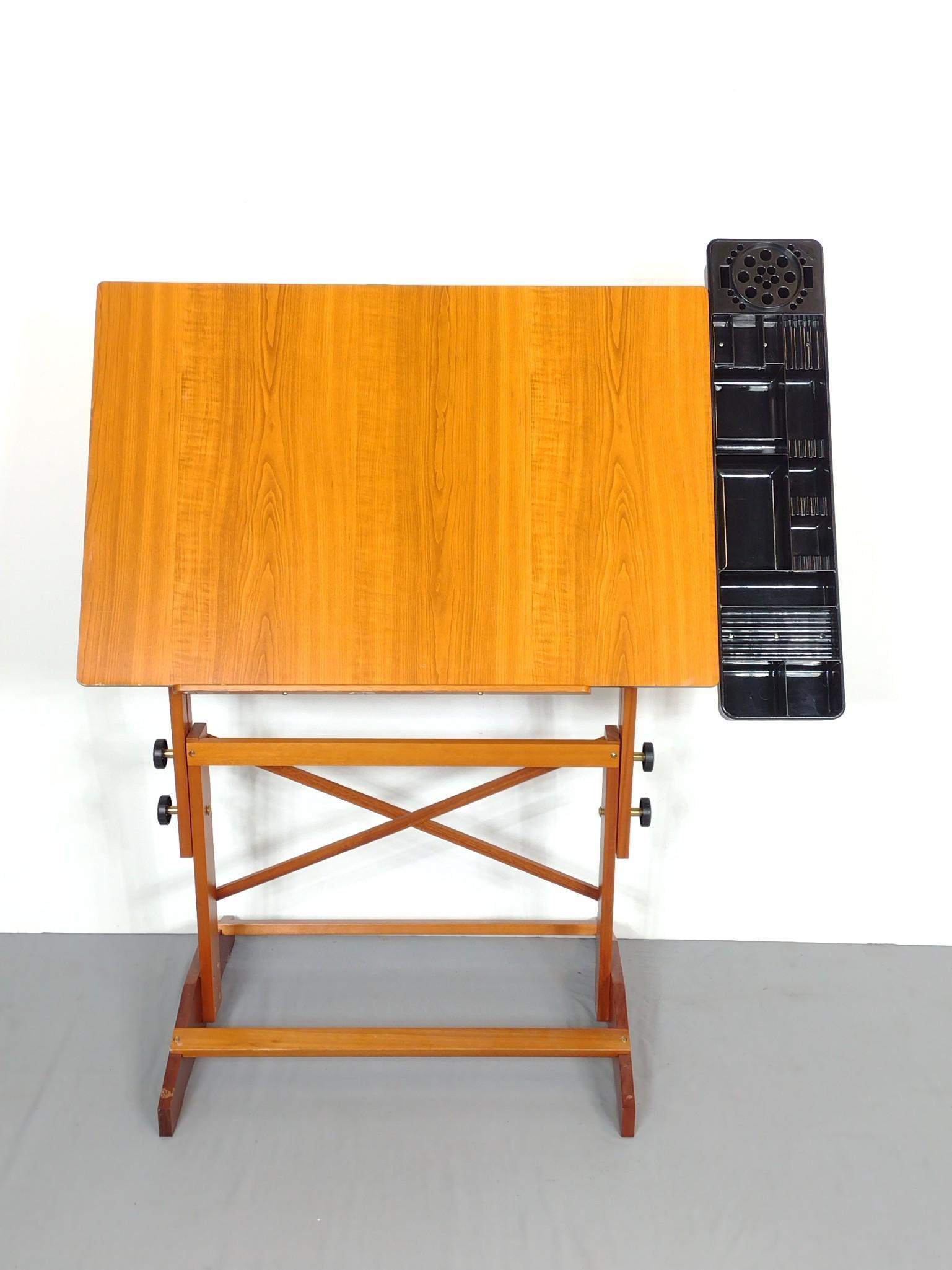 Alvin Drafting Table: 43" wide X 22" deep X 51" high. Has some light scratches. MG. IMPORTANT: Before bidding, please read the terms and conditions. When you registered for the auction you agreed to these terms and will be