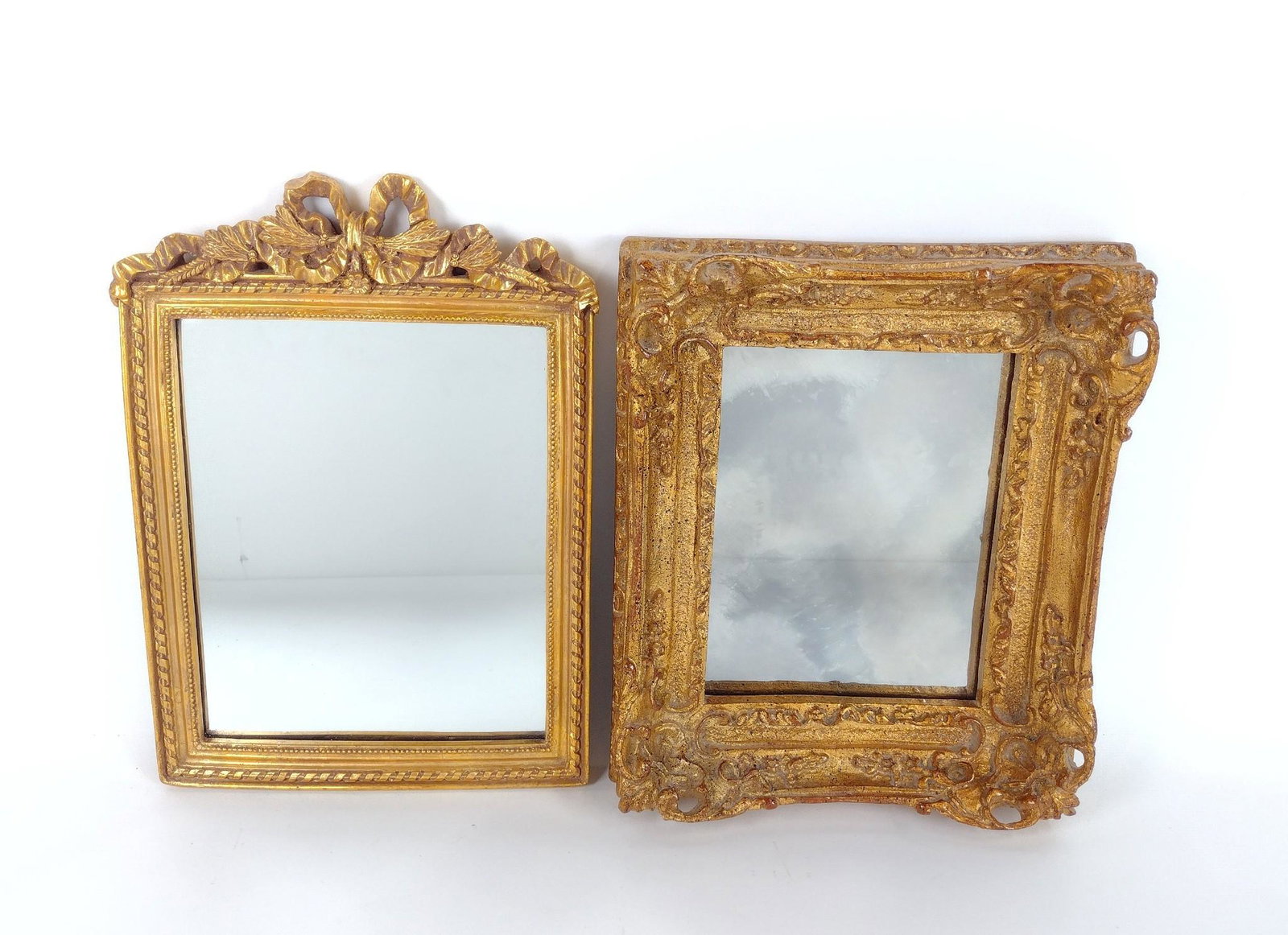 2 Gilt Wall Mirrors: Overall with frame 10" to 11" wide X 12" to 14" high. MEG IMPORTANT: Before bidding, please read the terms and conditions. When you registered for the auction you agreed to these terms and will be req