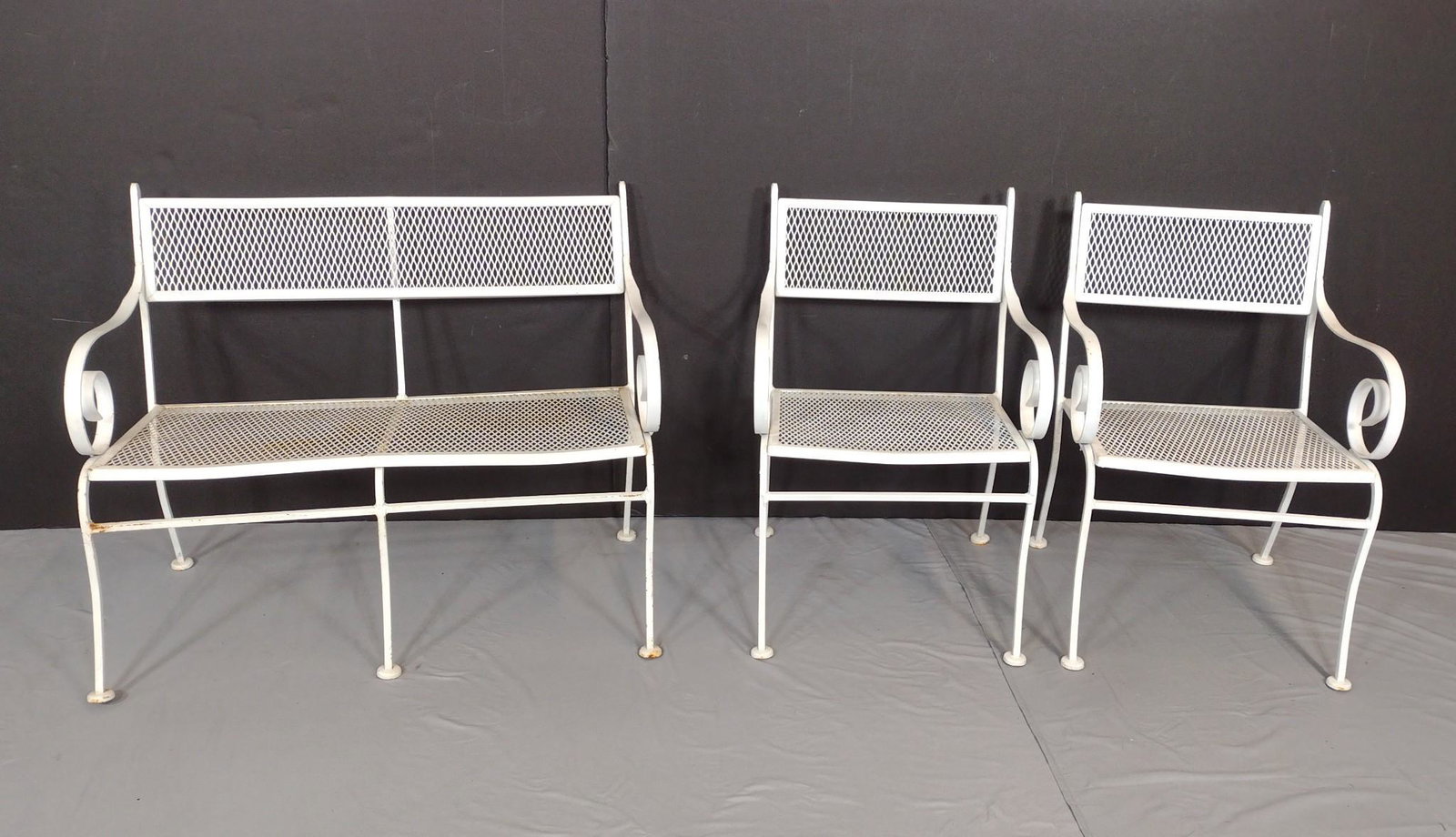 3 Pcs White Metal Patio Furniture: Settee 39" wide X 21" deep X 31-1/2" high. Arm chairs 21-1/2" wide X 21" deep X 31" high. All Pcs have some finish loss and spots of rust. MG. IMPORTANT: Before bidding, please read the terms and cond