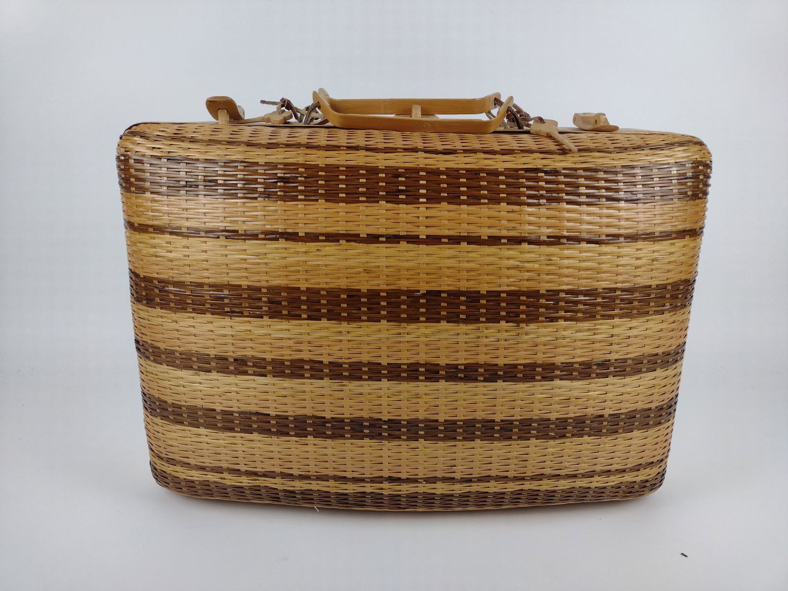 Wicker Suitcase: 19" wide x 8" deep x 14" high. JB IMPORTANT: Before bidding, please read the terms and conditions. When you registered for the auction you agreed to these terms and will be required to comply with the