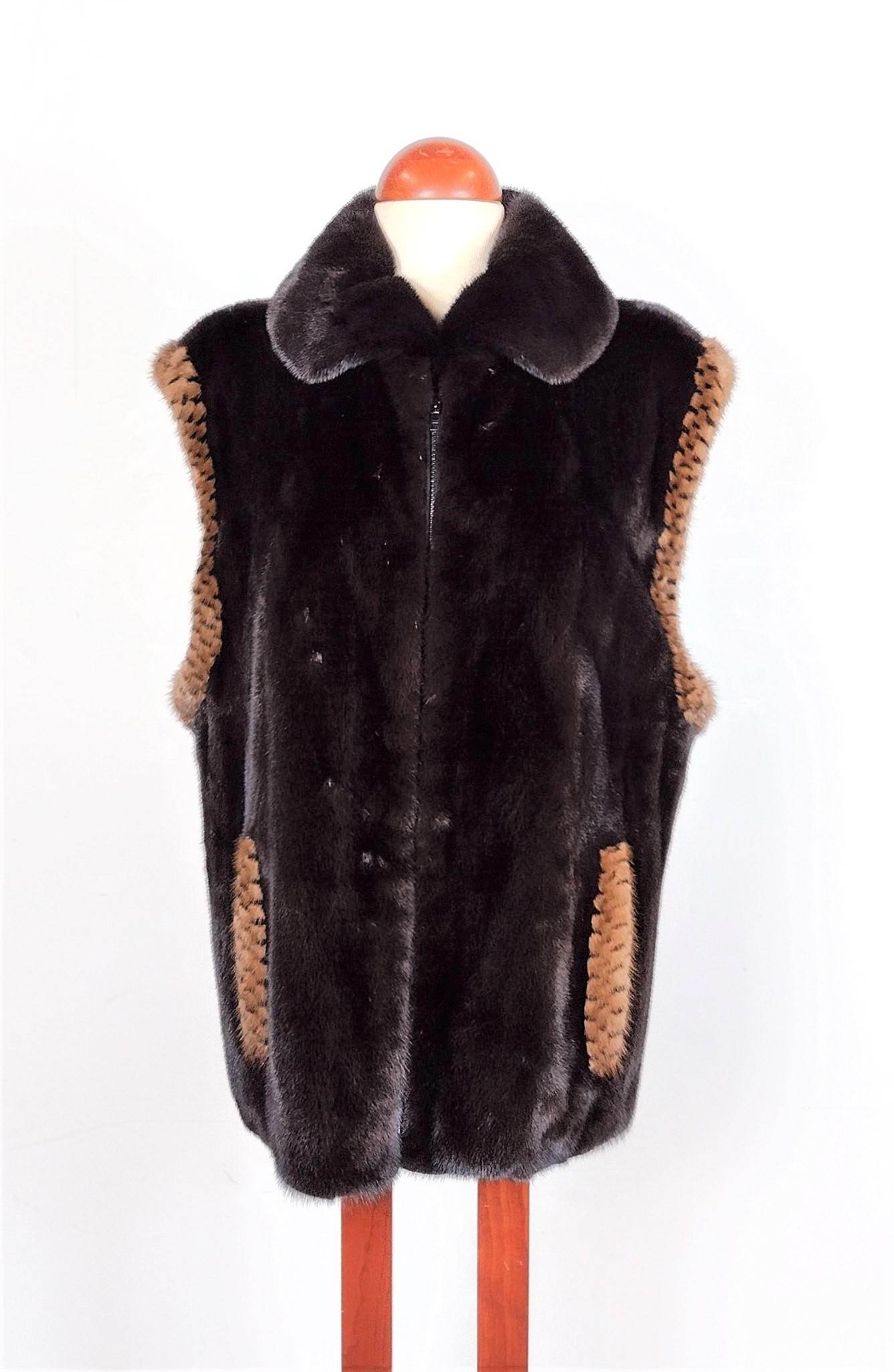 Louis Feraud Ranch Mink Fur Vest: Style F623. Size 8. Shoulder width: 20". Monogrammed L.R. at lower right interior. MEG IMPORTANT: Before bidding, please read the terms and conditions. When you registered for the auction you agreed t