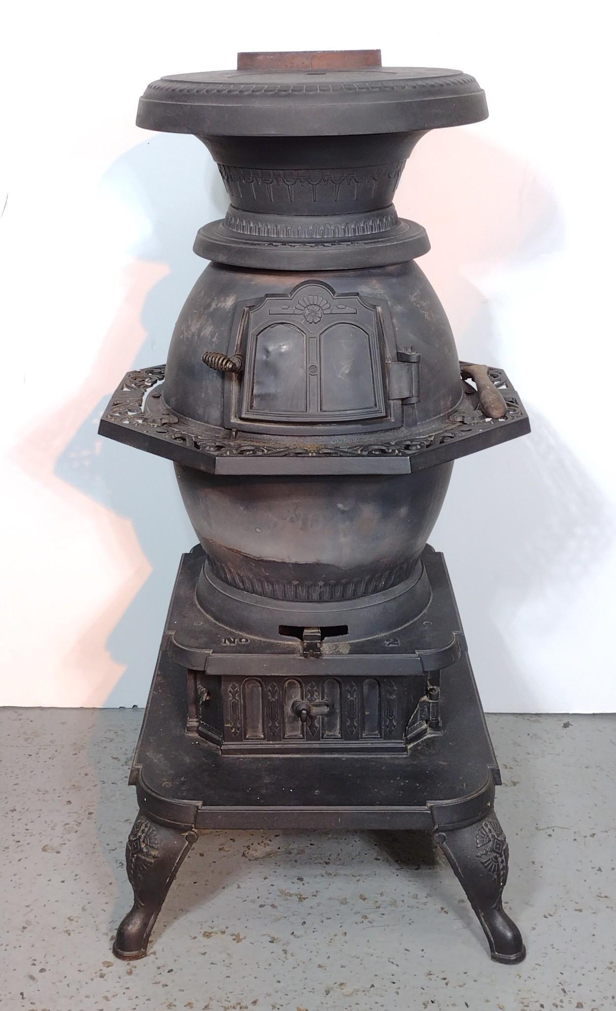 Abramcox Stove Co Cast Iron Stove: 24" wide X 26" deep X 47-1/2" high. Has large crack to main body. Lower door also has crack. MG. IMPORTANT: Before bidding, please read the terms and conditions. When you registered for the auction yo