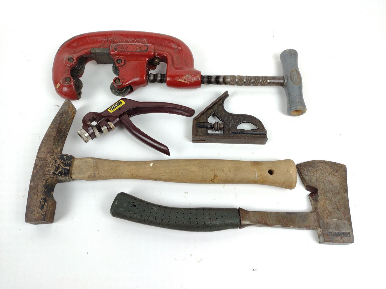 5 Vintage Tools incl Ridgid "C" Clamp: Also includes hatchet, rock hammer, Stanley pistol grip saw set. JB IMPORTANT: Before bidding, please read the terms and conditions. When you registered for the auction you agreed to these terms and w