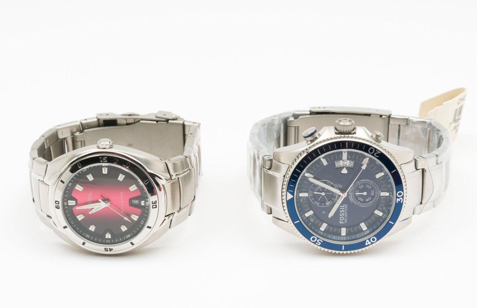 2 Fossil Gentleman's Wristwatches In OBs: 2-1/4" lug to lug on 9" adjustable bands. AJ/MH IMPORTANT: Before bidding, please read the terms and conditions. When you registered for the auction you agreed to these terms and will be required