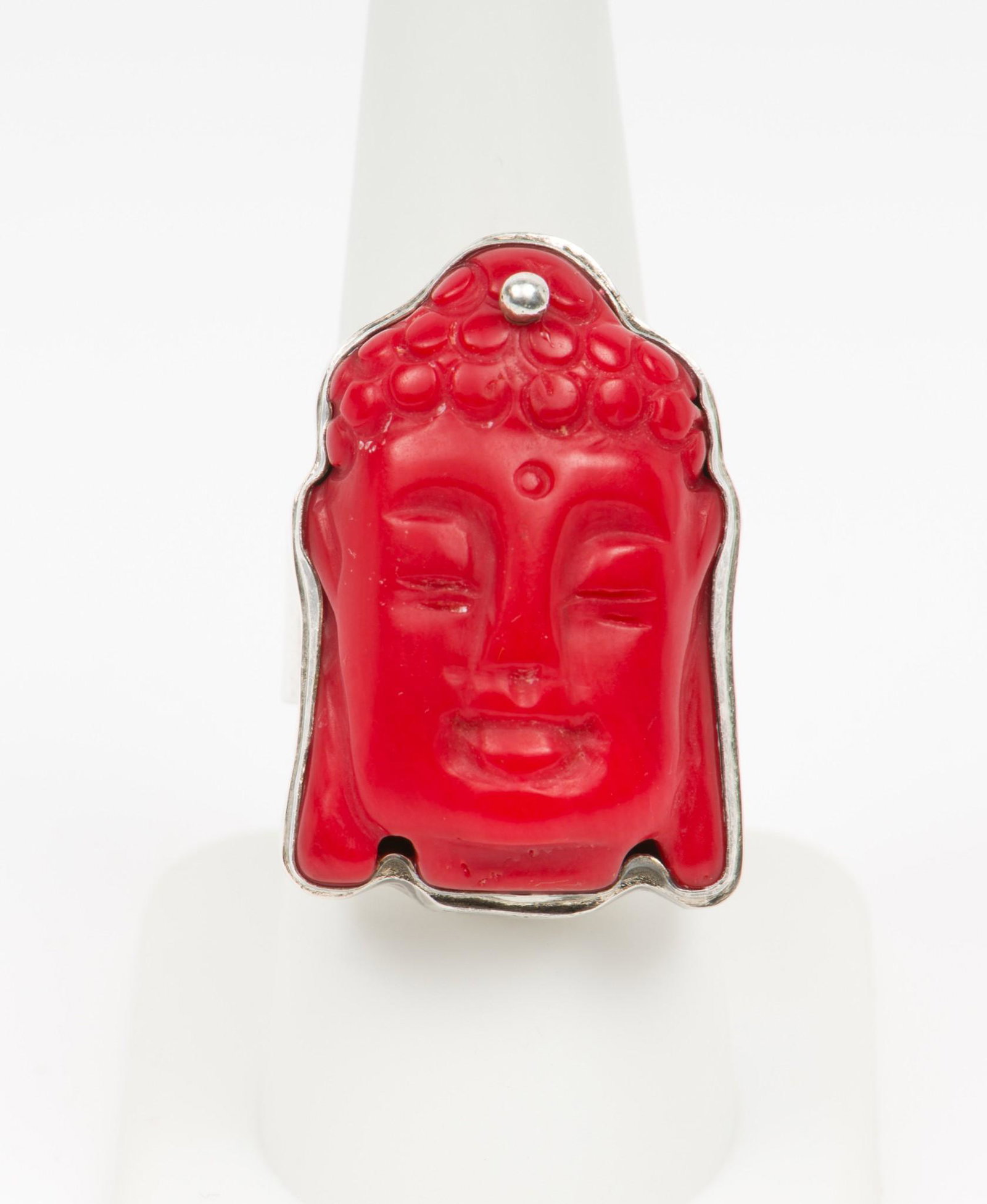 Sterling Carved Coral Buddha Head Ring: Chinese sterling ring with carved coral Buddha head. Marked "KH 925." Coral 1-1/2" x 3/4". Size 8. EK IMPORTANT: Before bidding, please read the terms and conditions. When you registered for the aucti